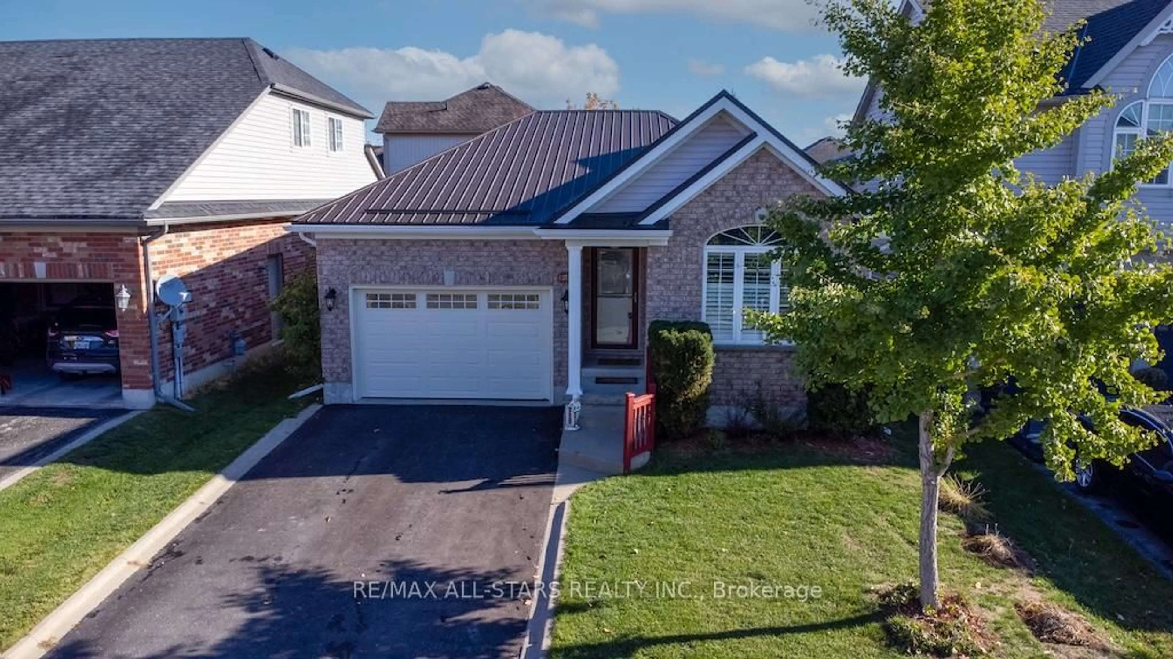 A pic from outside/outdoor area/front of a property/back of a property/a pic from drone, street for 43 Thrushwood Tr, Kawartha Lakes Ontario K9V 0B2