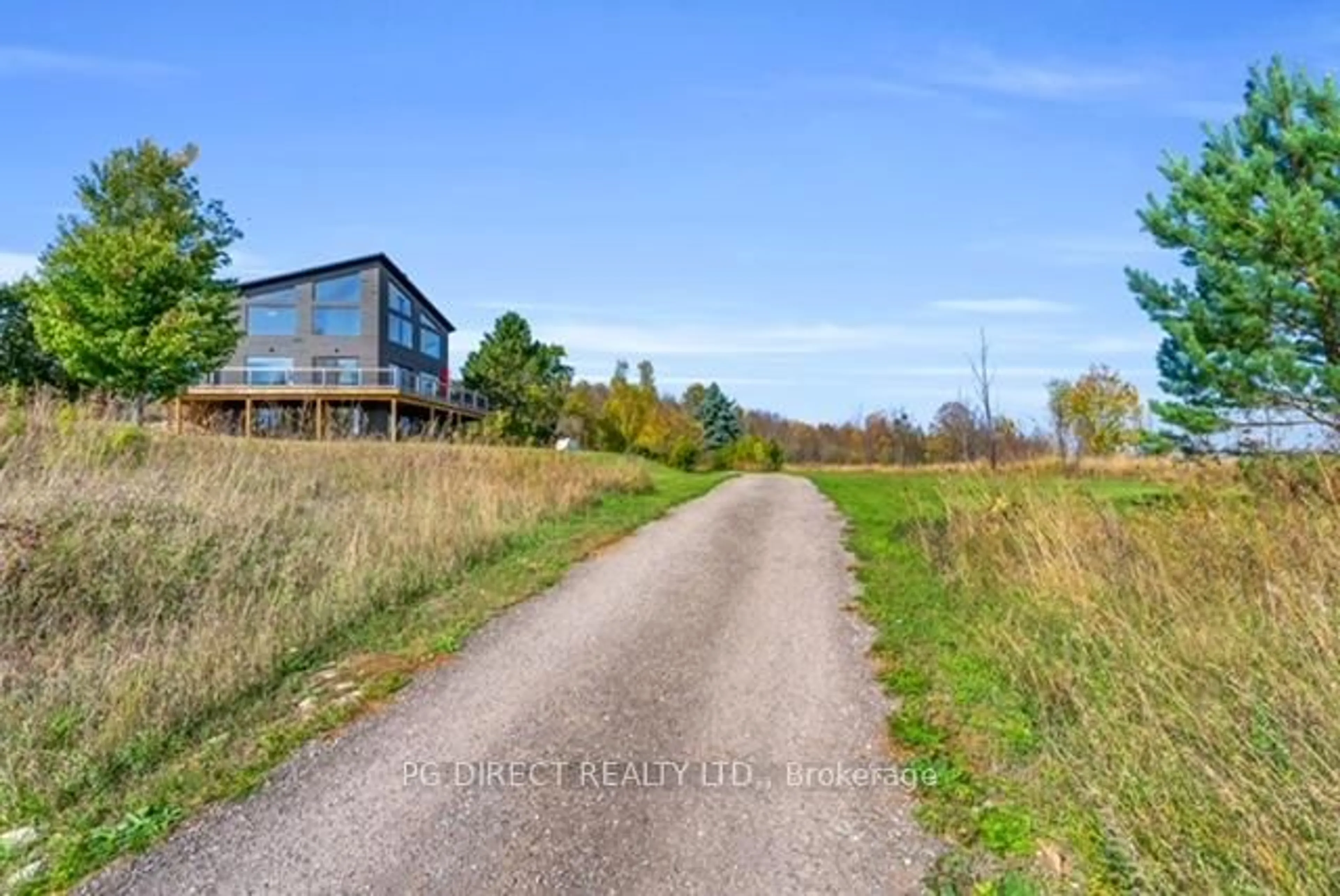 A pic from outside/outdoor area/front of a property/back of a property/a pic from drone, unknown for 707585 County Rd 21, Mulmur Ontario L9V 0W9