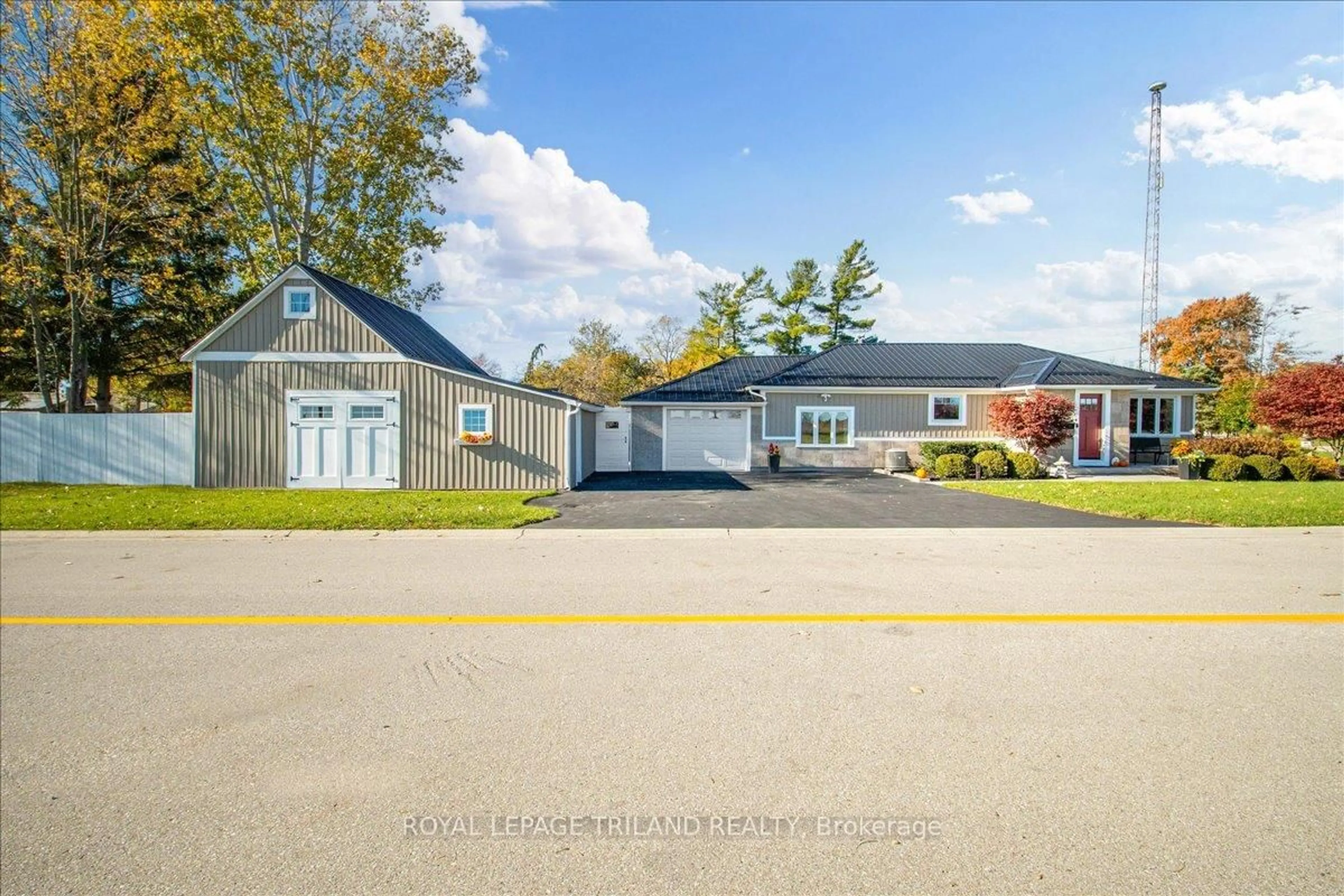 A pic from outside/outdoor area/front of a property/back of a property/a pic from drone, street for 19 Front Ave, Southwest Middlesex Ontario N0L 1A0