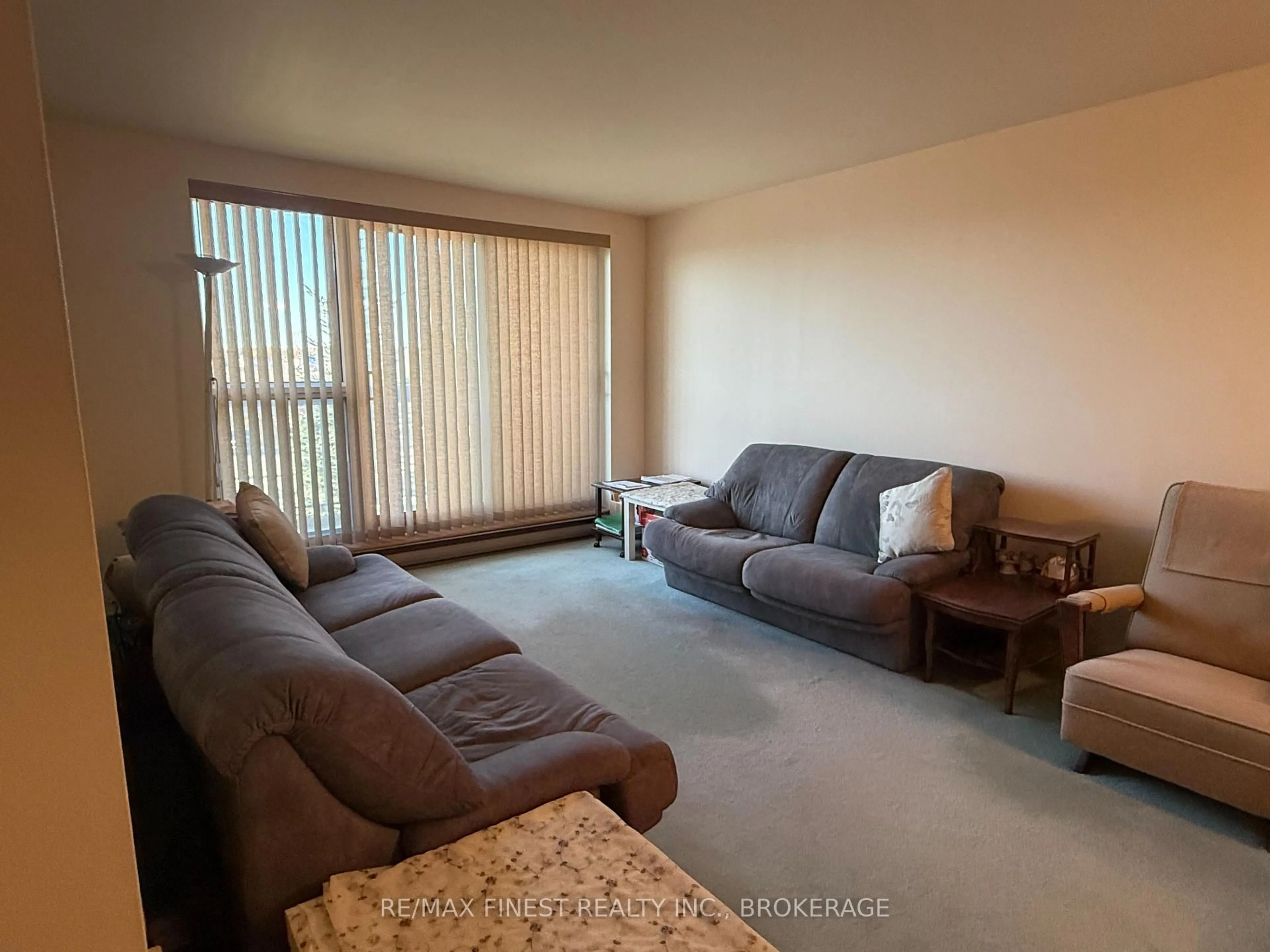 Living room with furniture, floor is not visible for 334 Queen Mary Rd #206, Kingston Ontario K7M 7E7