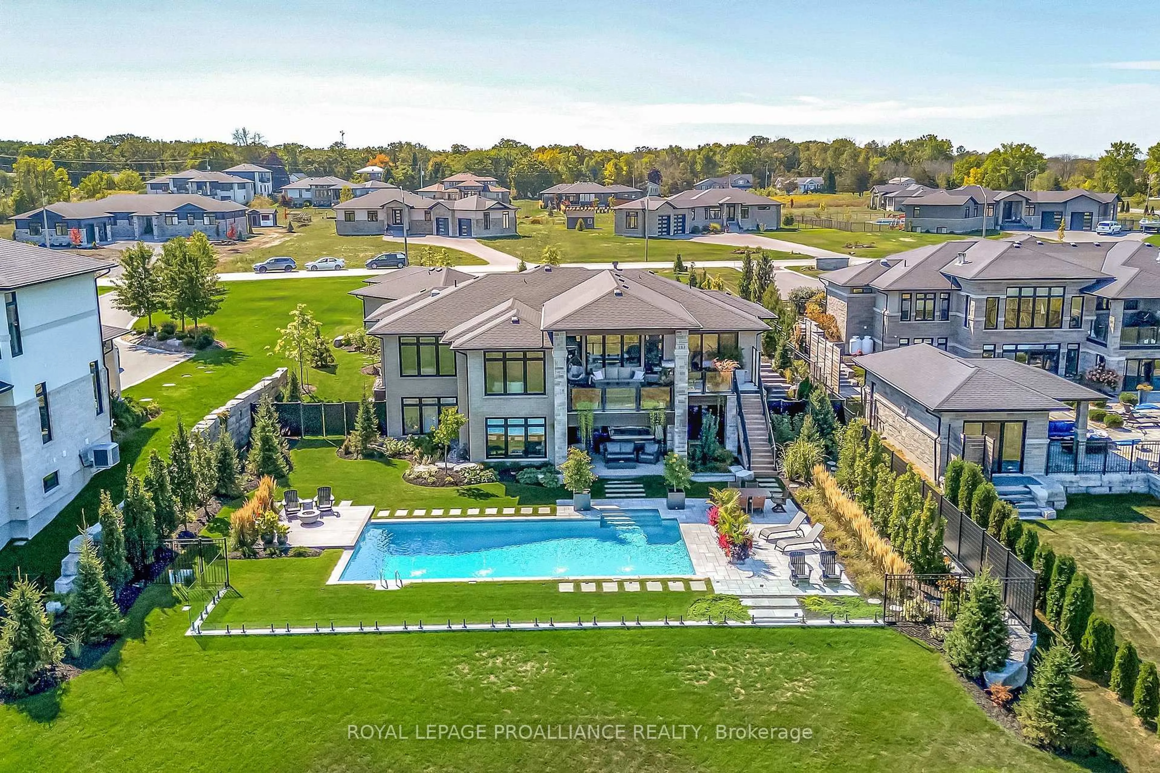 A pic from outside/outdoor area/front of a property/back of a property/a pic from drone, water/lake/river/ocean view for 77 Navigation Dr, Prince Edward County Ontario K8N 0G1