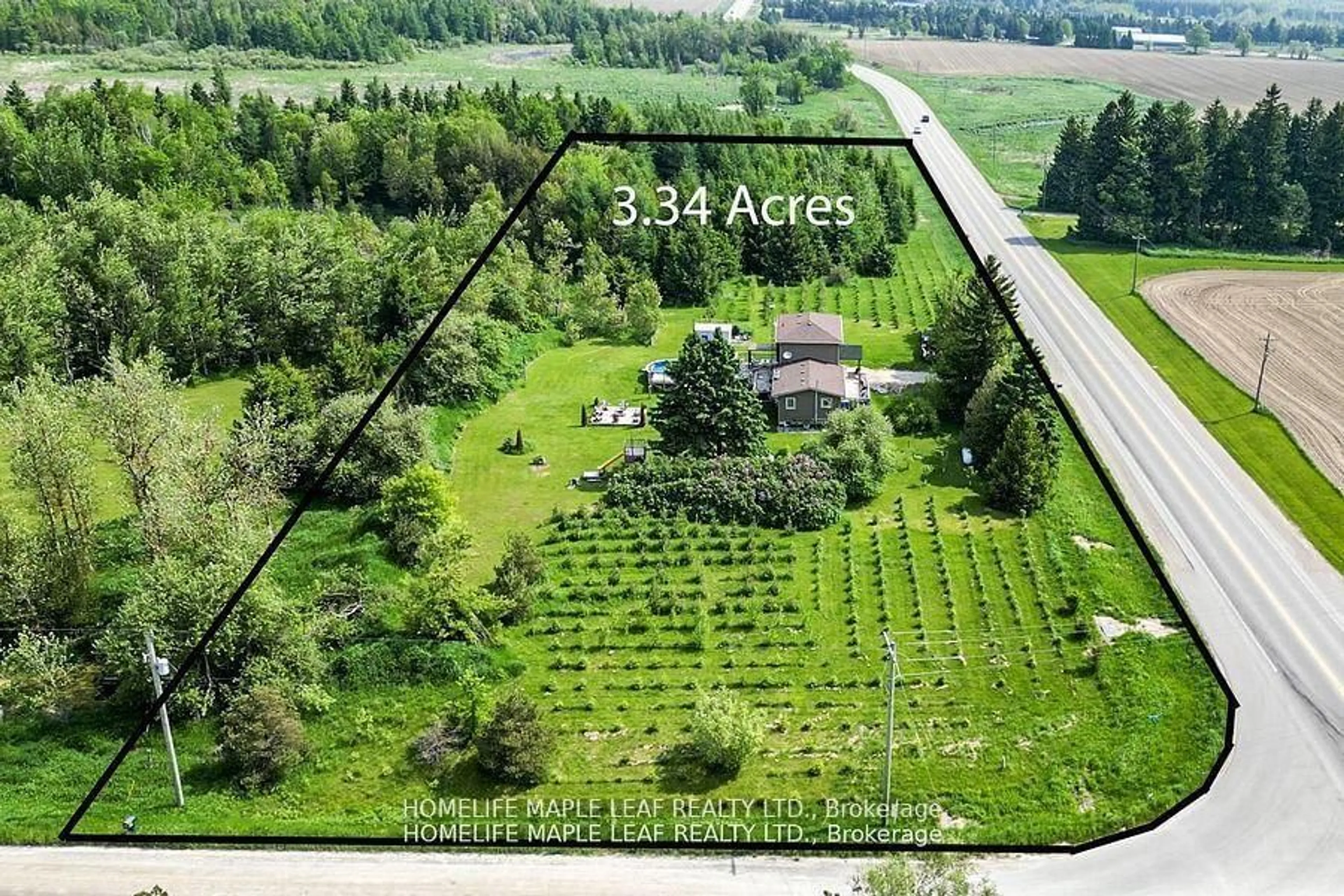 A pic from outside/outdoor area/front of a property/back of a property/a pic from drone, forest/trees view for 64149 County Road 3, East Garafraxa Ontario L9W 7J4