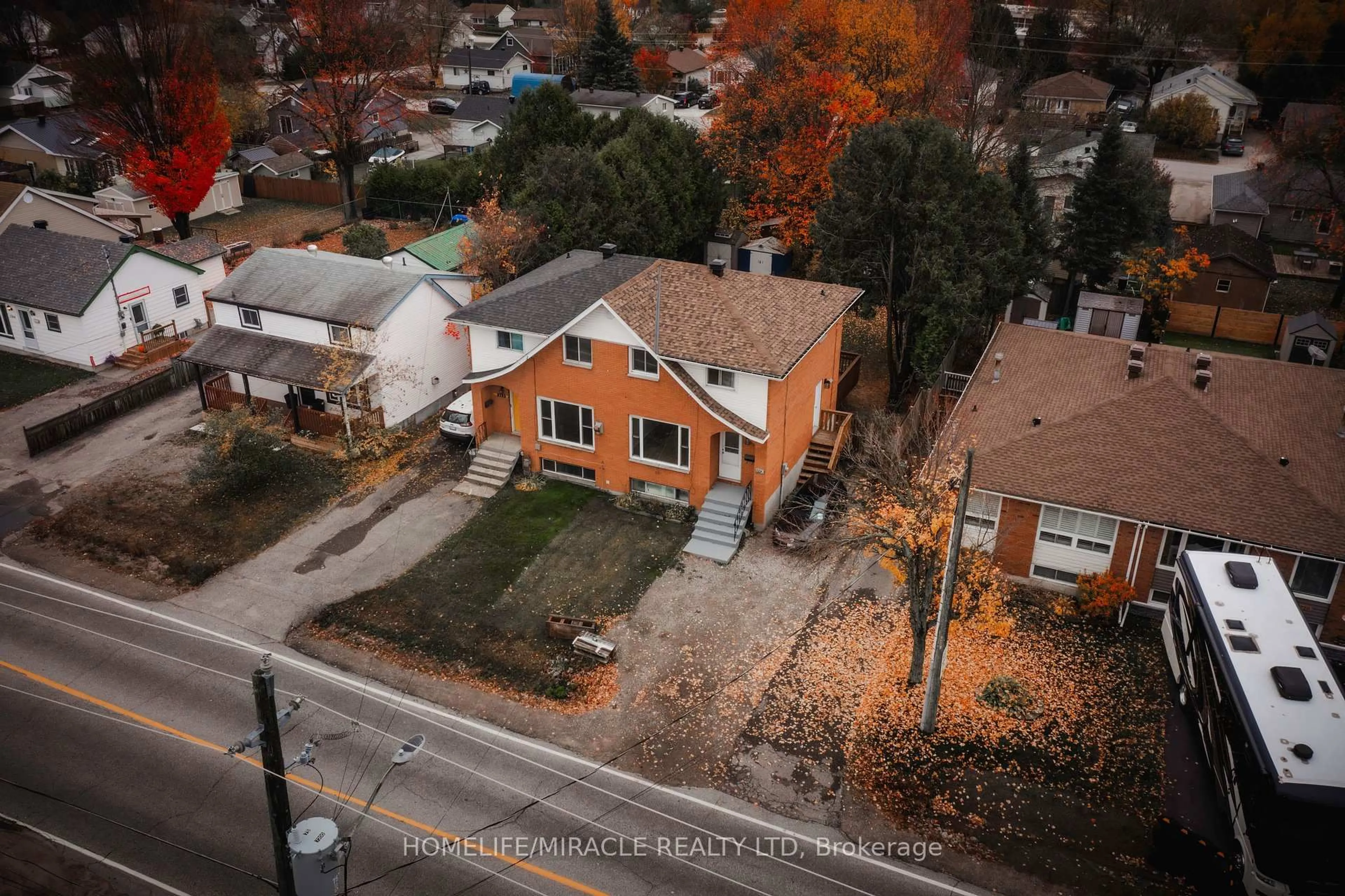 A pic from outside/outdoor area/front of a property/back of a property/a pic from drone, street for 1728 Mckeown Ave, North Bay Ontario P1B 7N3