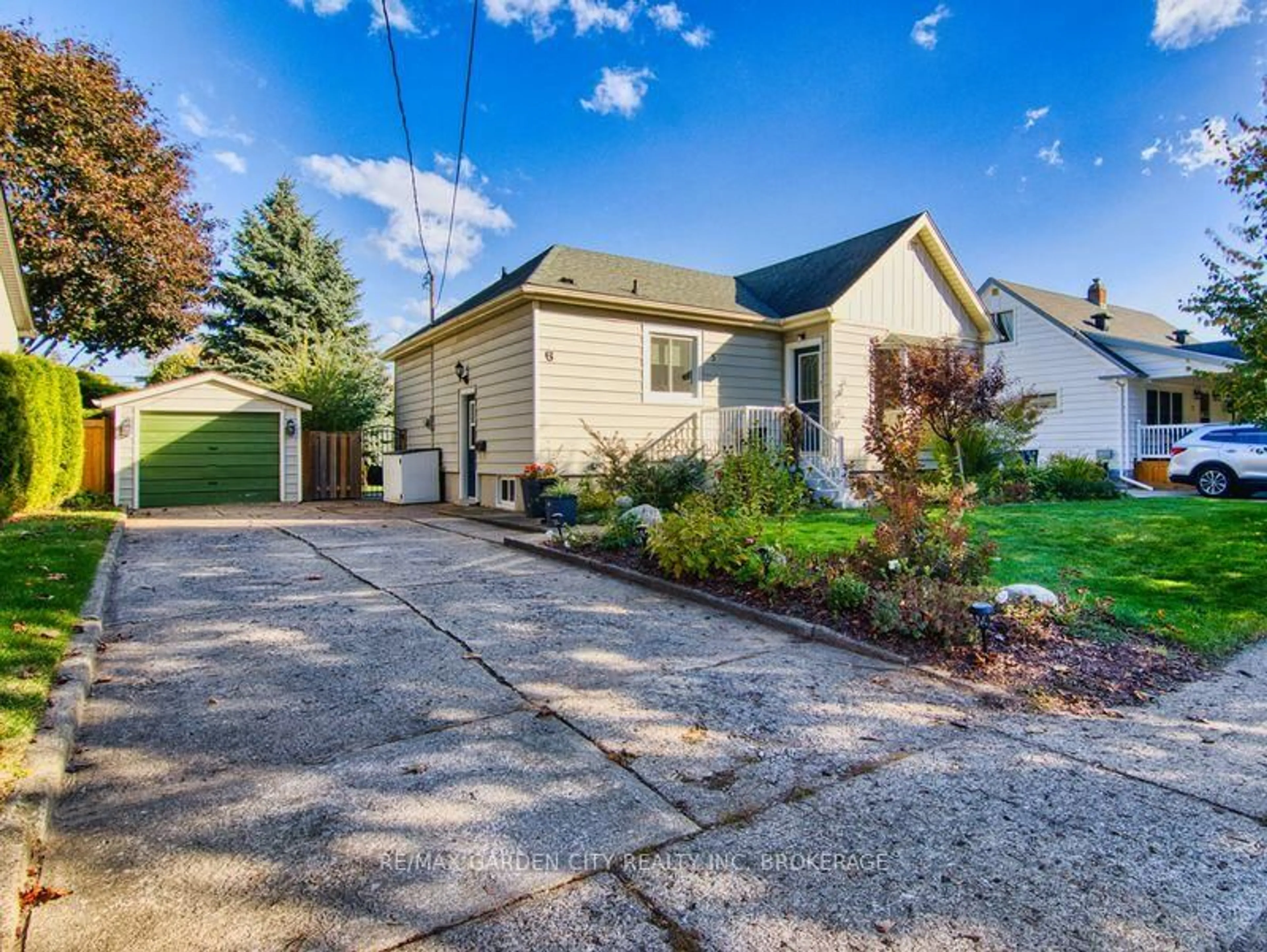 Home with vinyl exterior material, street for 5 Hewko St, St. Catharines Ontario L2N 2E2