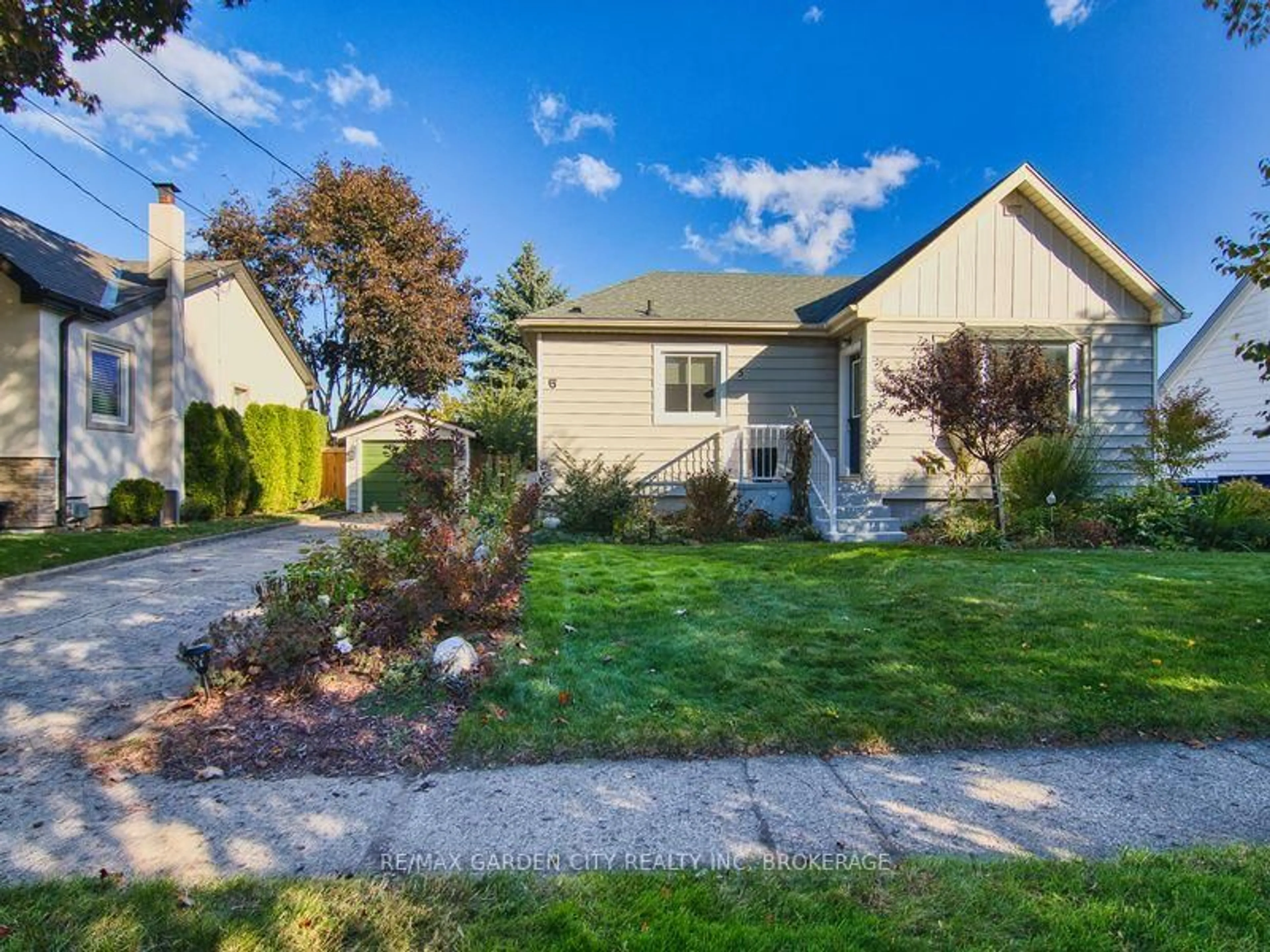 Home with vinyl exterior material, street for 5 Hewko St, St. Catharines Ontario L2N 2E2