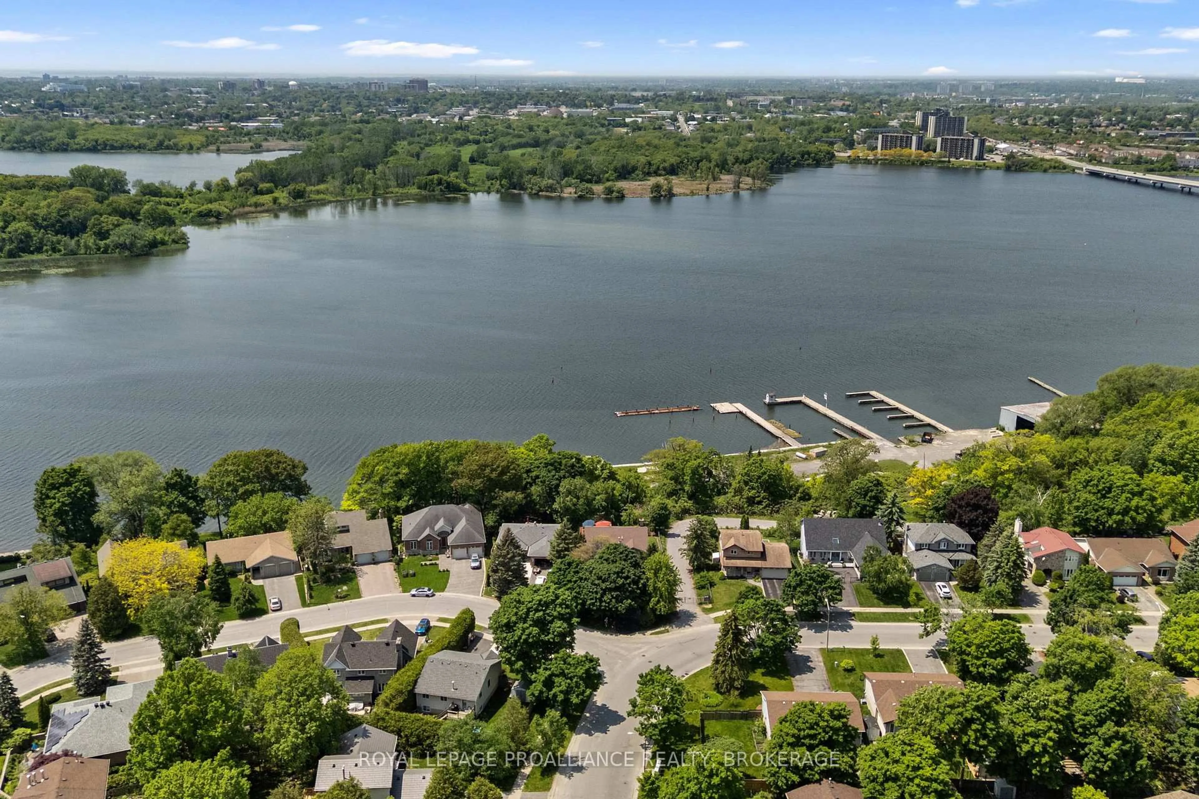 A pic from outside/outdoor area/front of a property/back of a property/a pic from drone, water/lake/river/ocean view for 80 Limeridge Dr, Kingston Ontario K7K 6L8