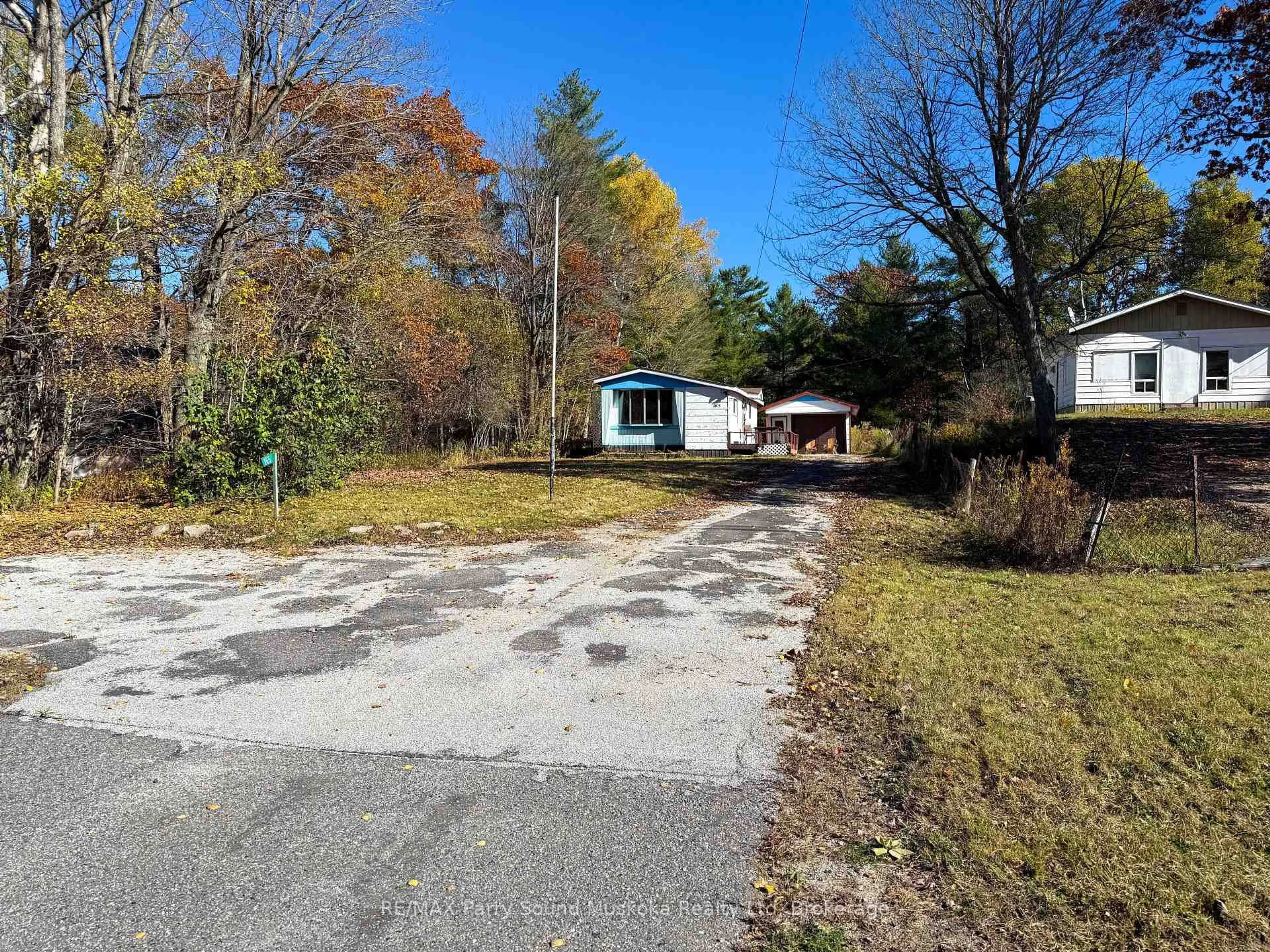 A pic from outside/outdoor area/front of a property/back of a property/a pic from drone, street for 165 Nobel Rd, McDougall Ontario P2A 2W9