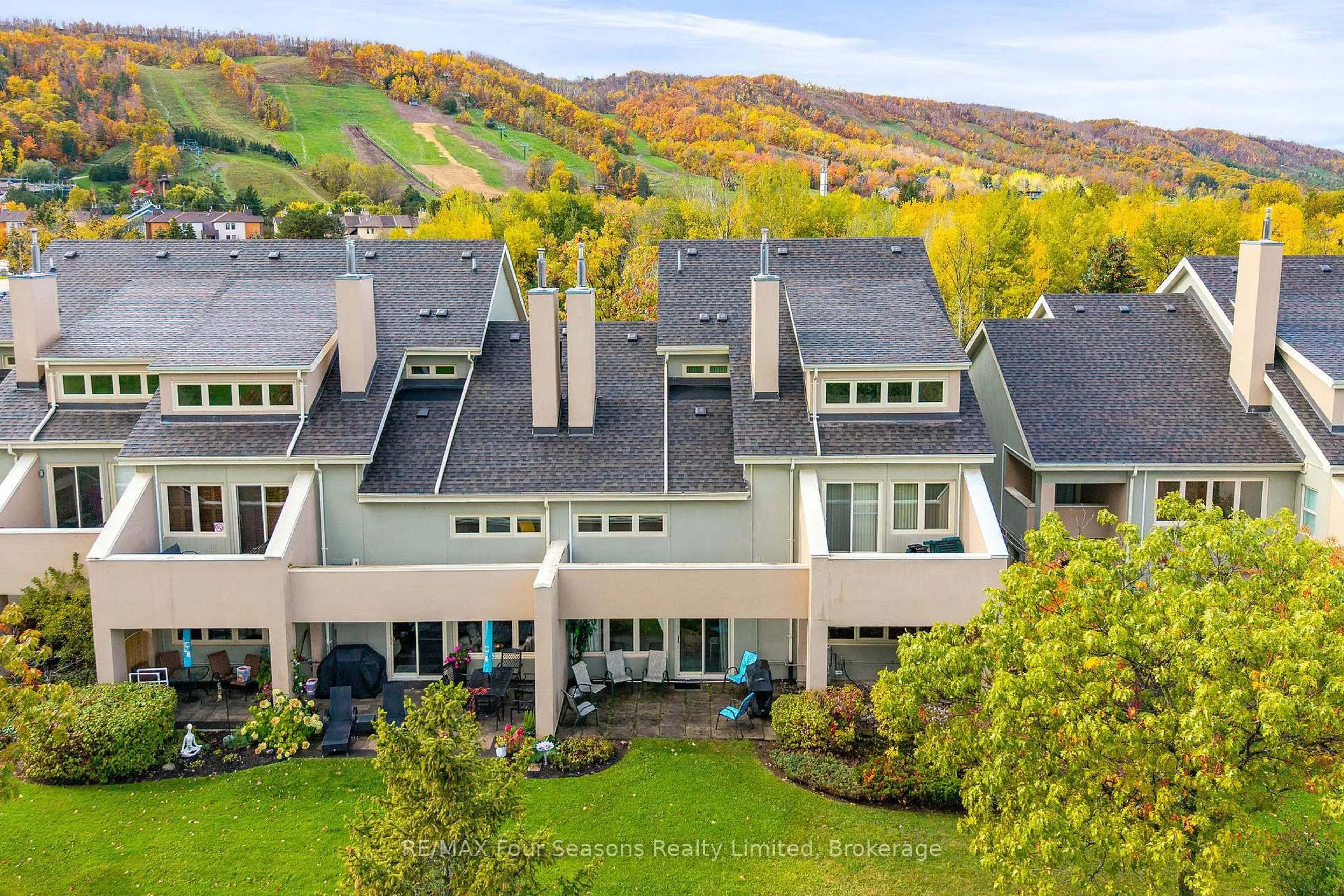 A pic from outside/outdoor area/front of a property/back of a property/a pic from drone, mountain view for 107 Wintergreen Pl #113, Blue Mountains Ontario L9Y 0P8