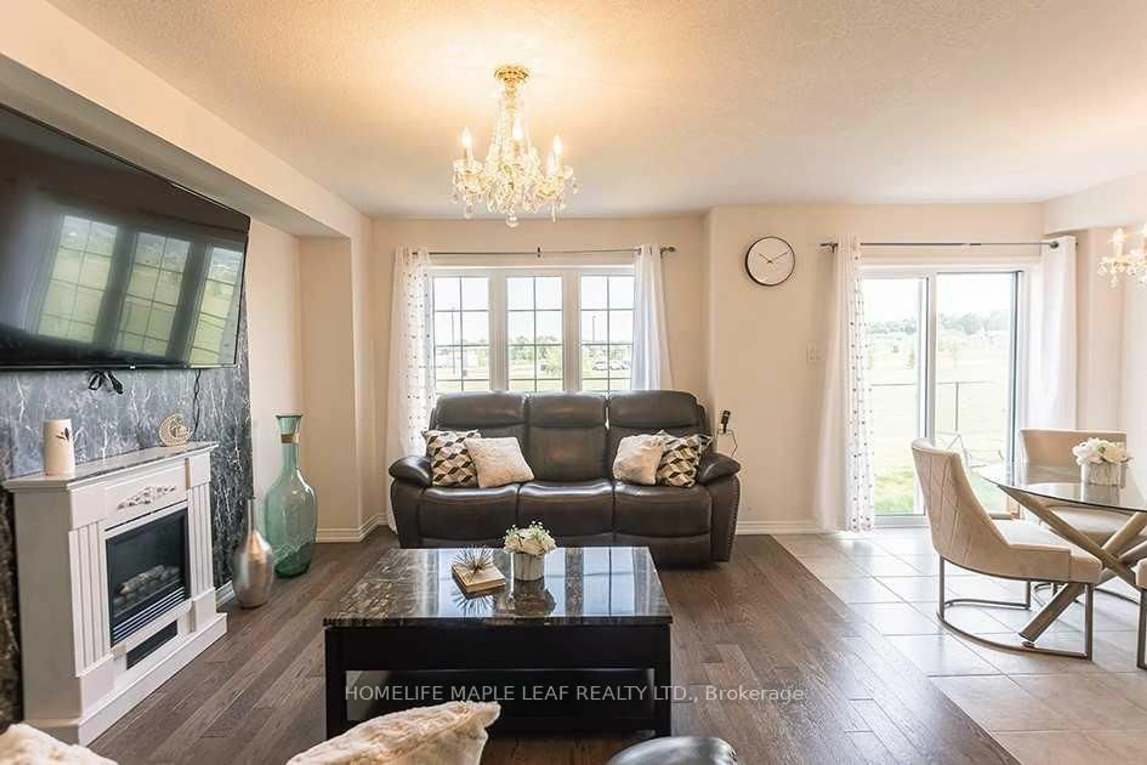 Living room with furniture, wood/laminate floor for 3 Cooke Ave, Brantford Ontario N3T 0S2