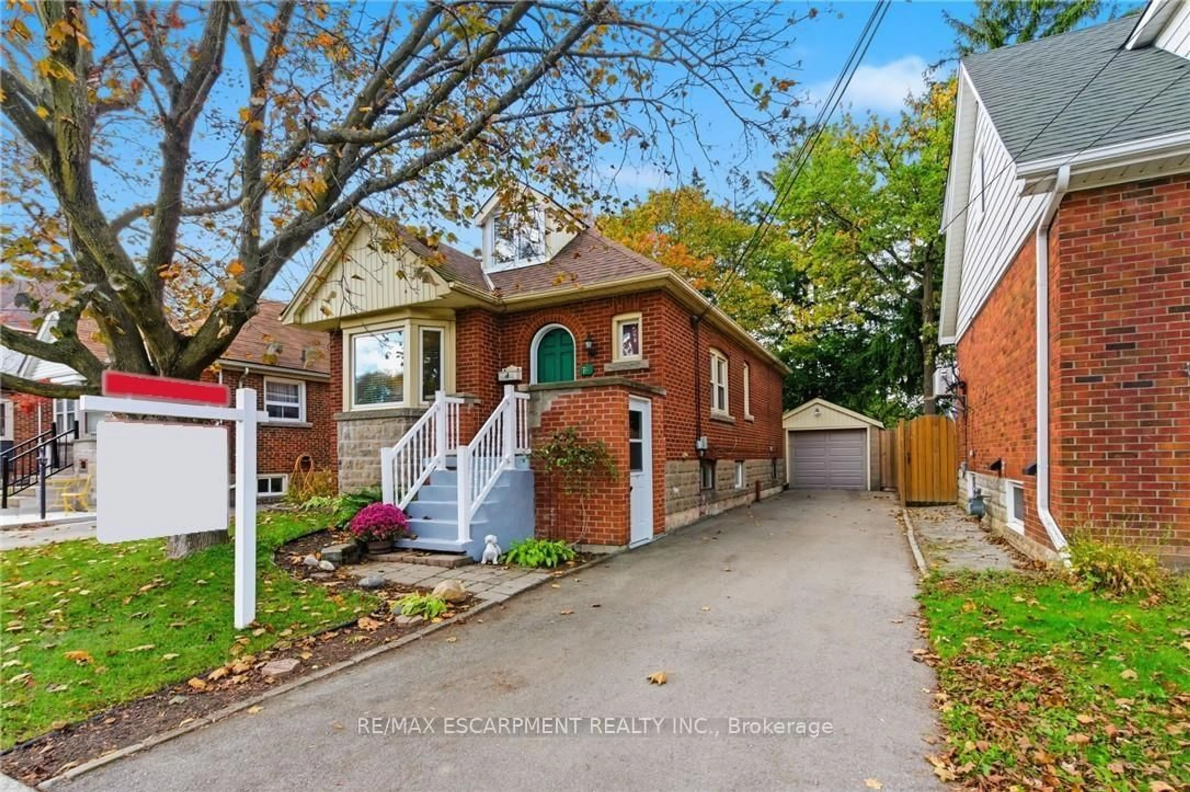 Home with brick exterior material, street for 76 EAST 15TH St, Hamilton Ontario L9A 4E9