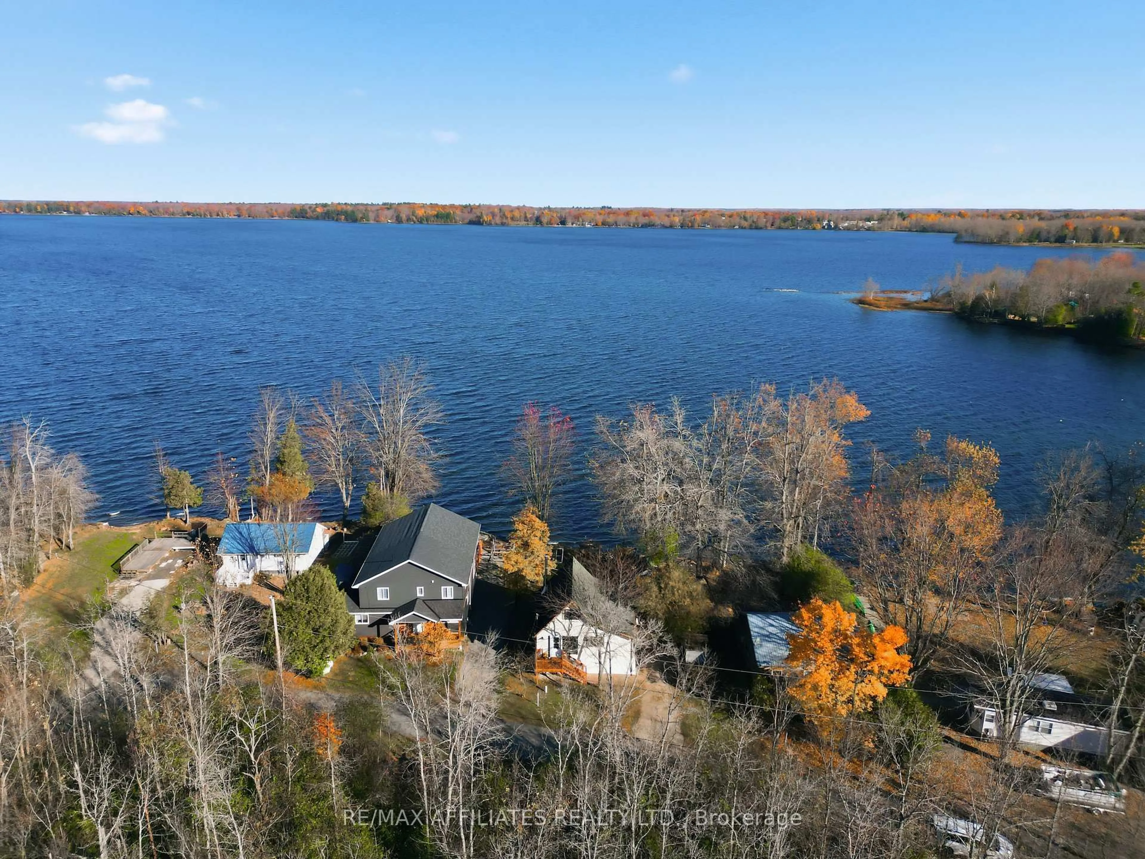 A pic from outside/outdoor area/front of a property/back of a property/a pic from drone, water/lake/river/ocean view for 124 Mccullough's Landing Rd, Perth Ontario K7H 0J3
