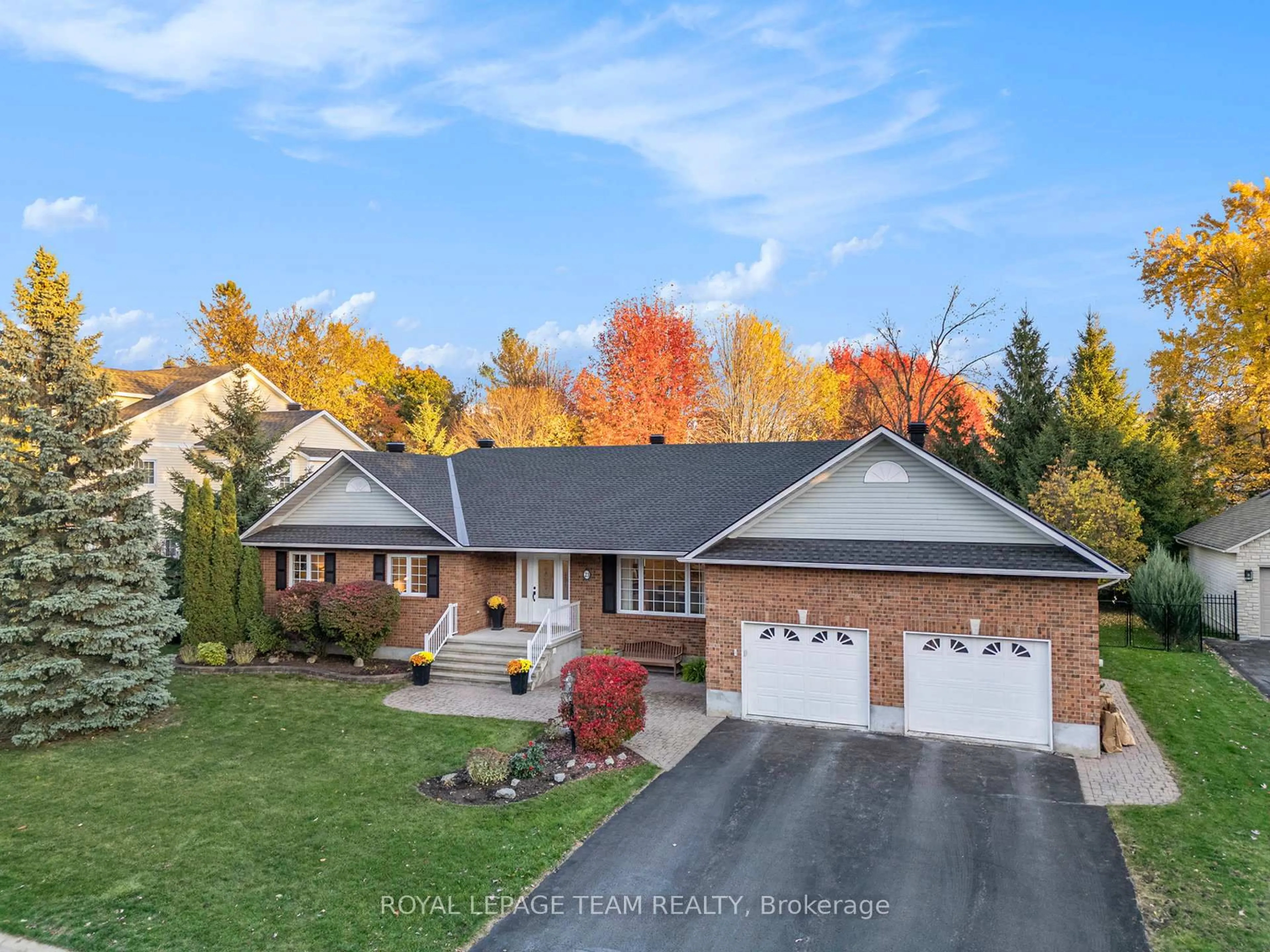 A pic from outside/outdoor area/front of a property/back of a property/a pic from drone, unknown for 23 Cypress Gdns, Stittsville Ontario K2S 1W6