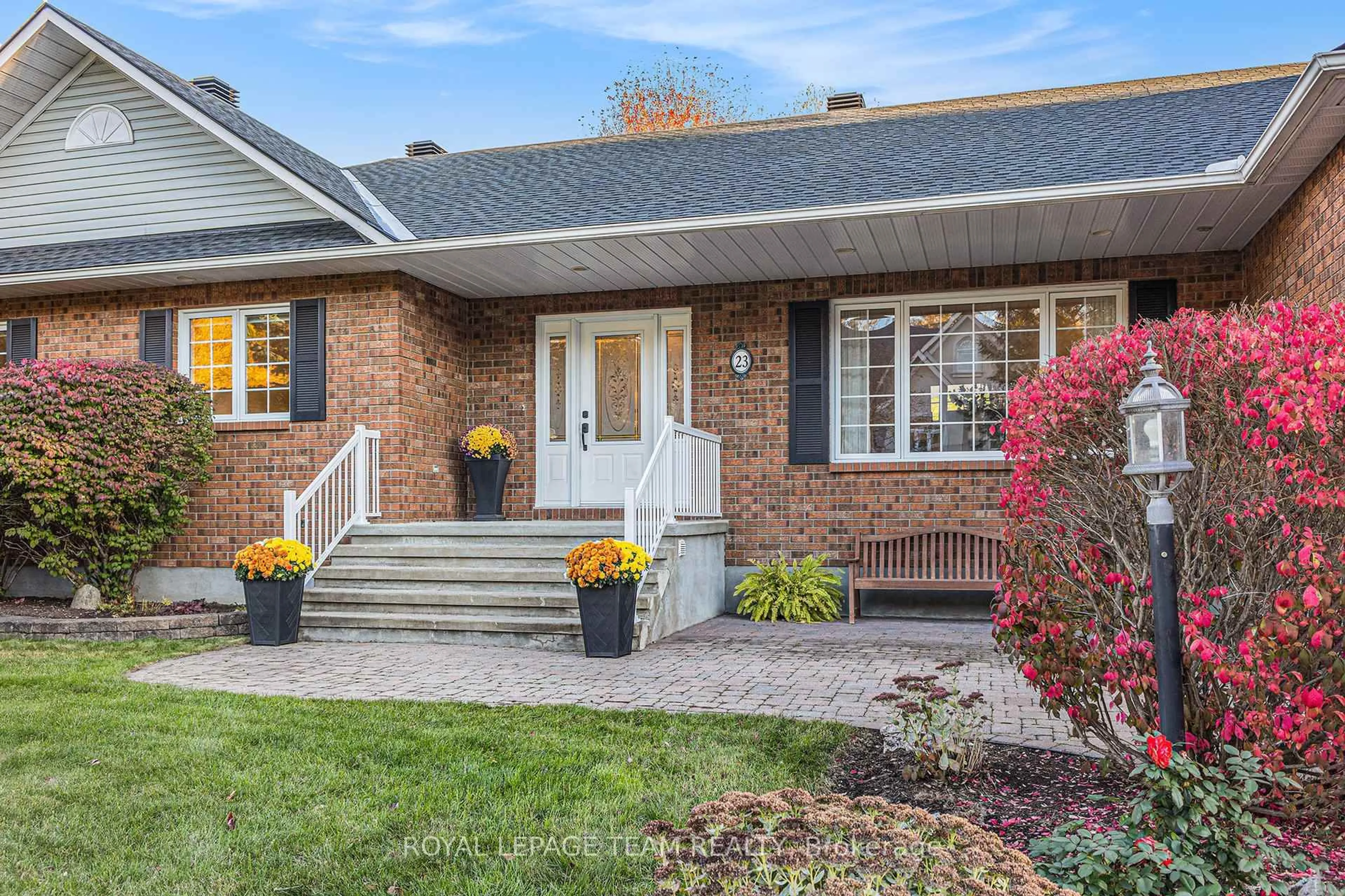 Home with brick exterior material, street for 23 Cypress Gdns, Stittsville Ontario K2S 1W6