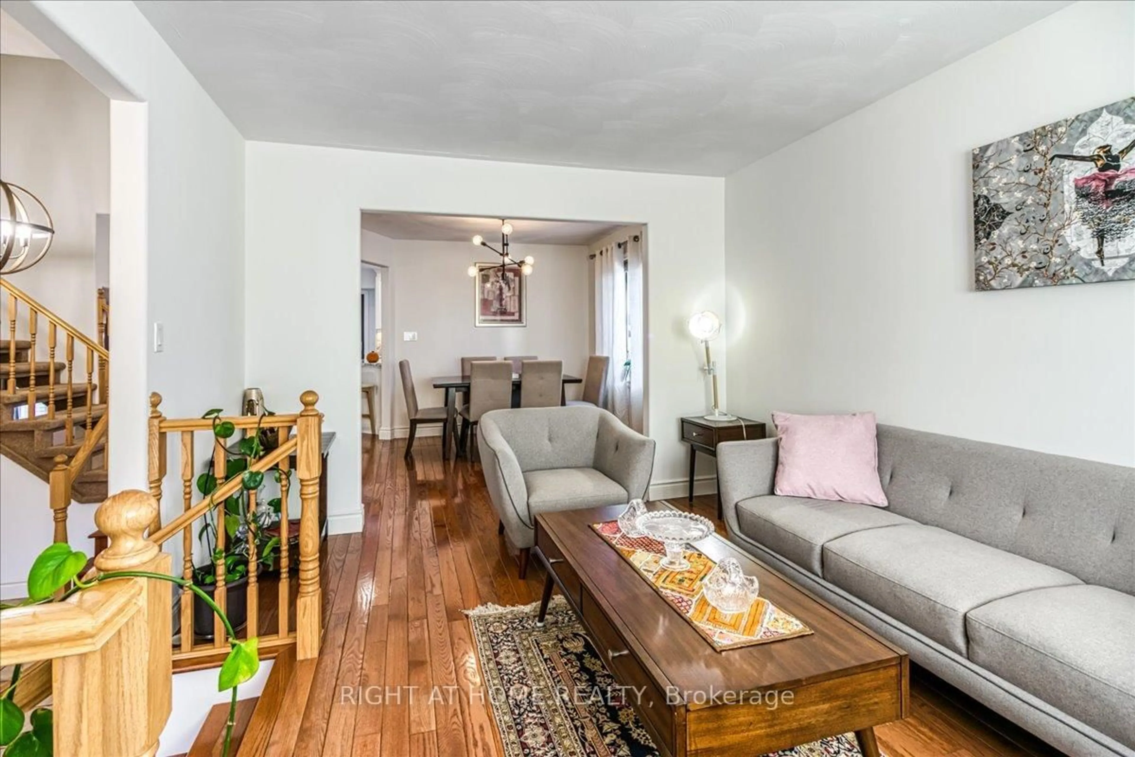 Living room with furniture, wood/laminate floor for 14 Abigail Crt, Greater Sudbury Ontario P3A 6C1