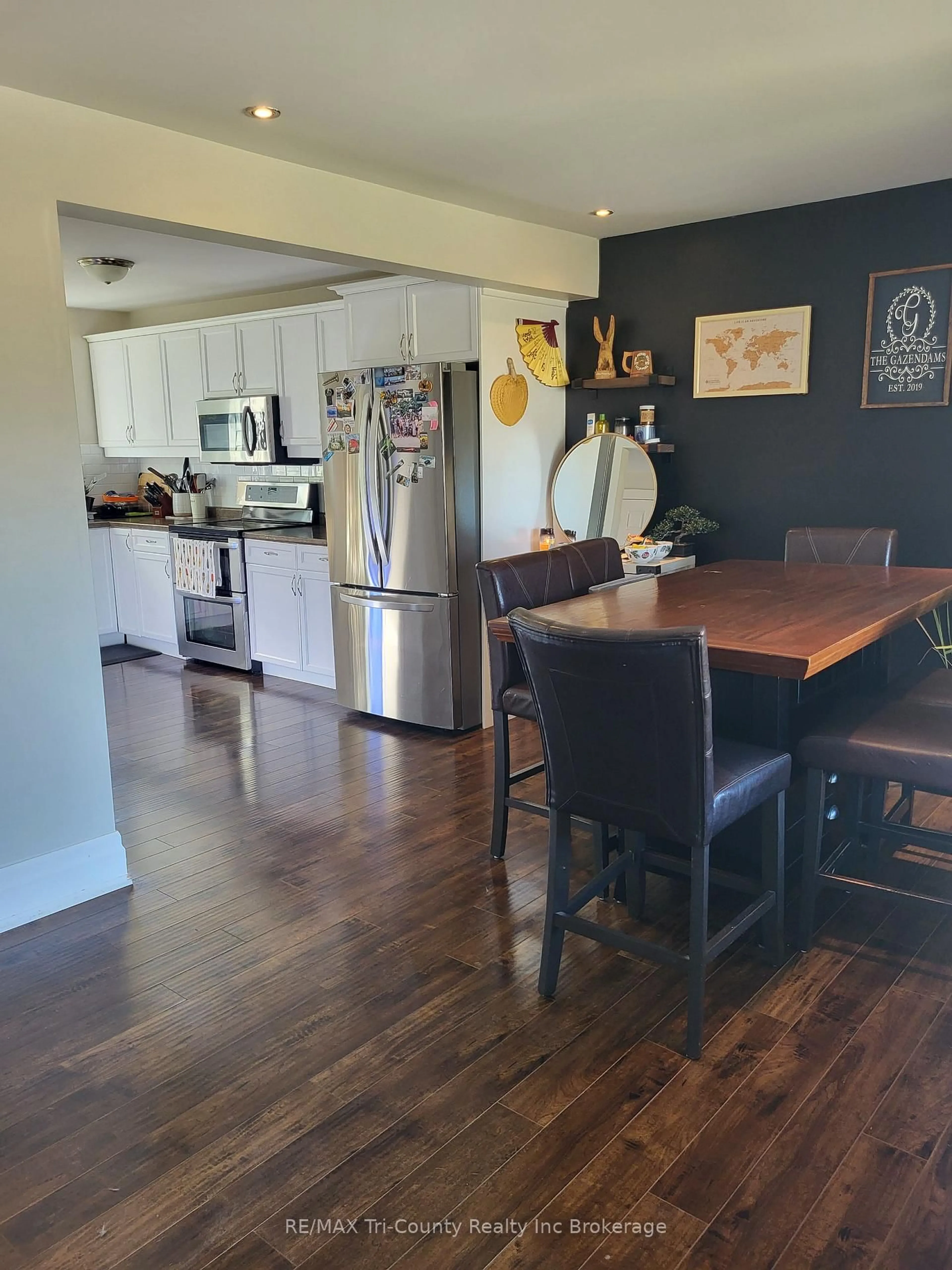 Open concept kitchen, wood/laminate floor for 324110 Mount Elgin Rd, South-West Oxford Ontario N0J 1N0