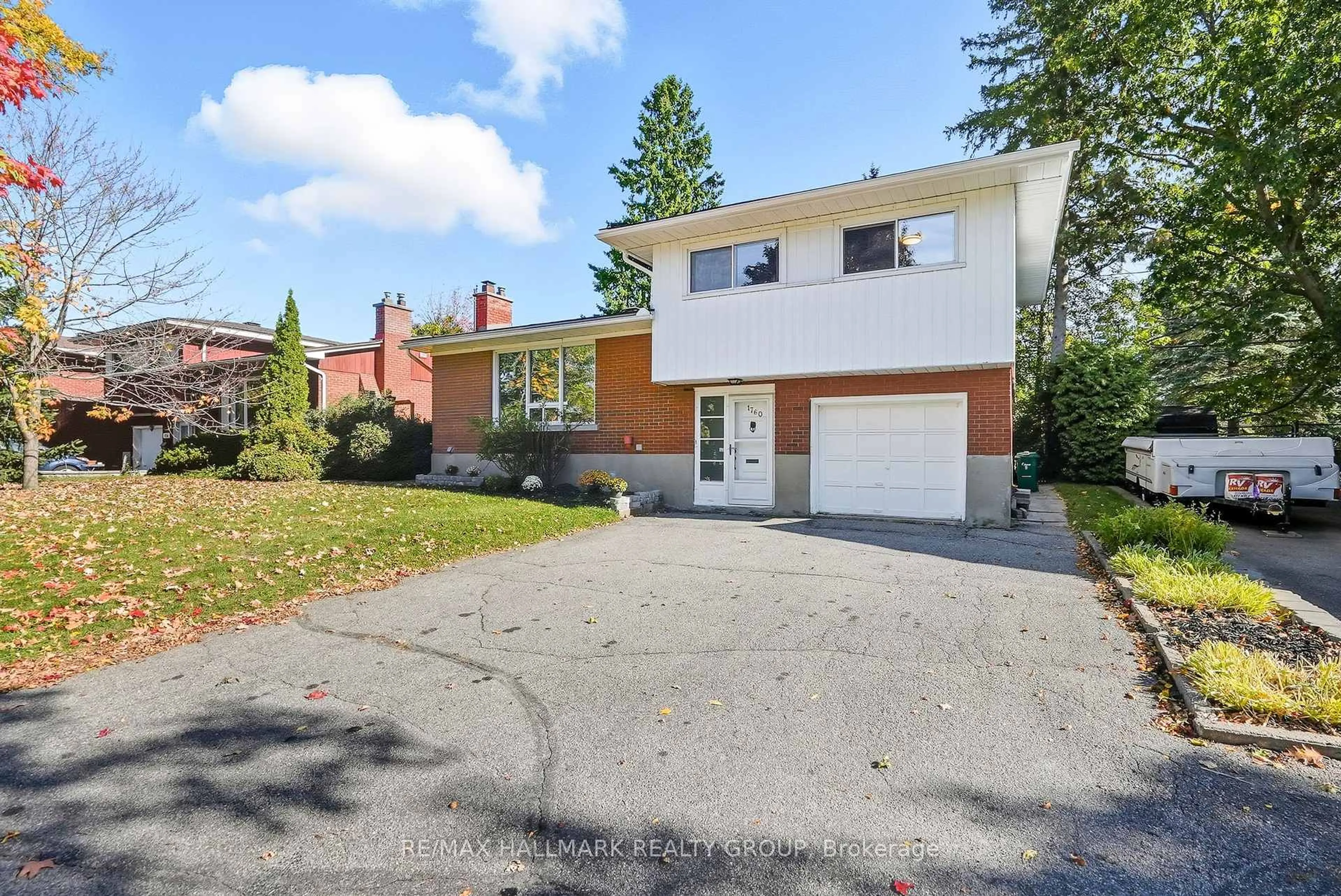 Home with brick exterior material, street for 1760 Laxton Cres, Ottawa Ontario K2C 2N3