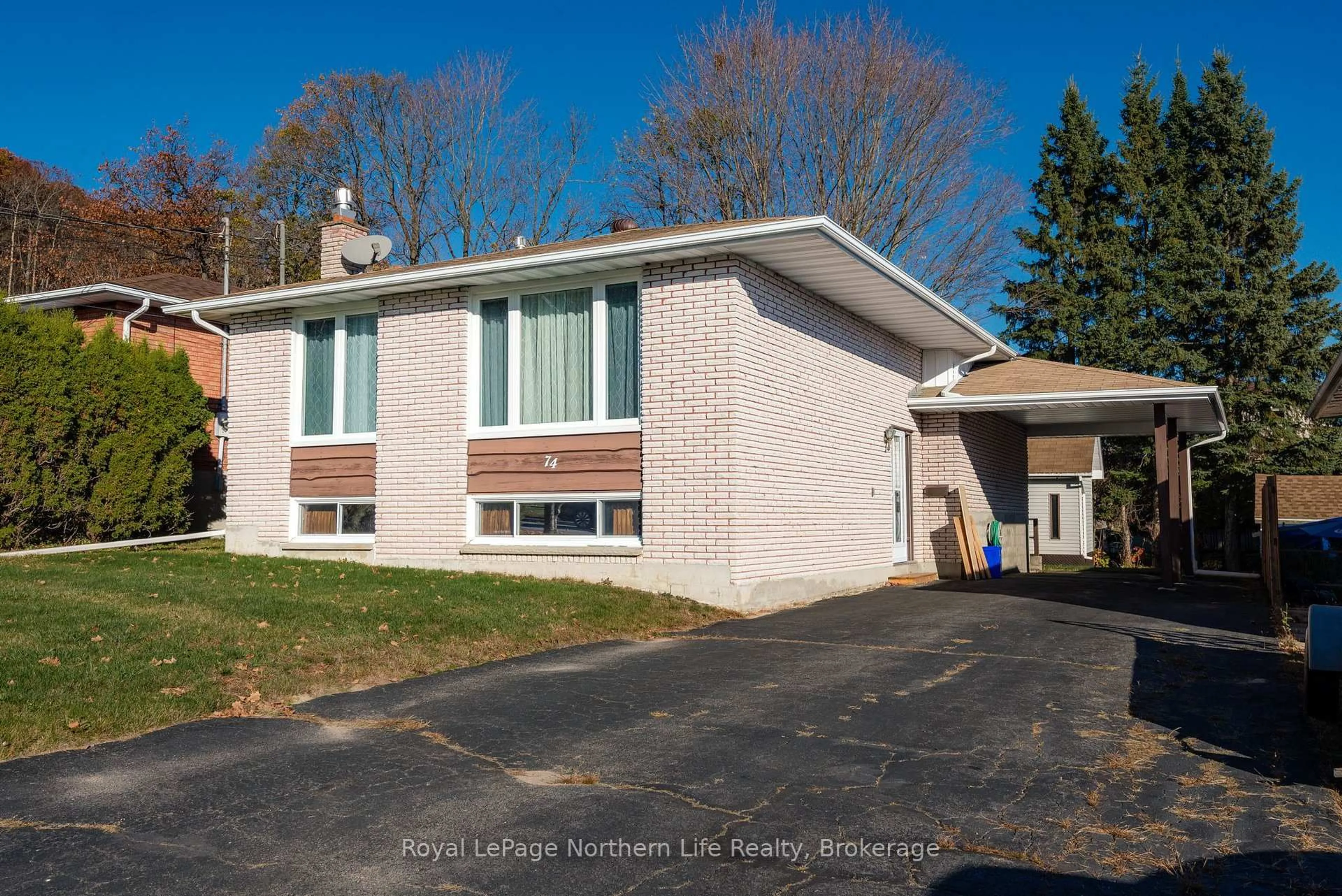 Home with vinyl exterior material, street for 74 Belleview Cres, North Bay Ontario P1B 8T7