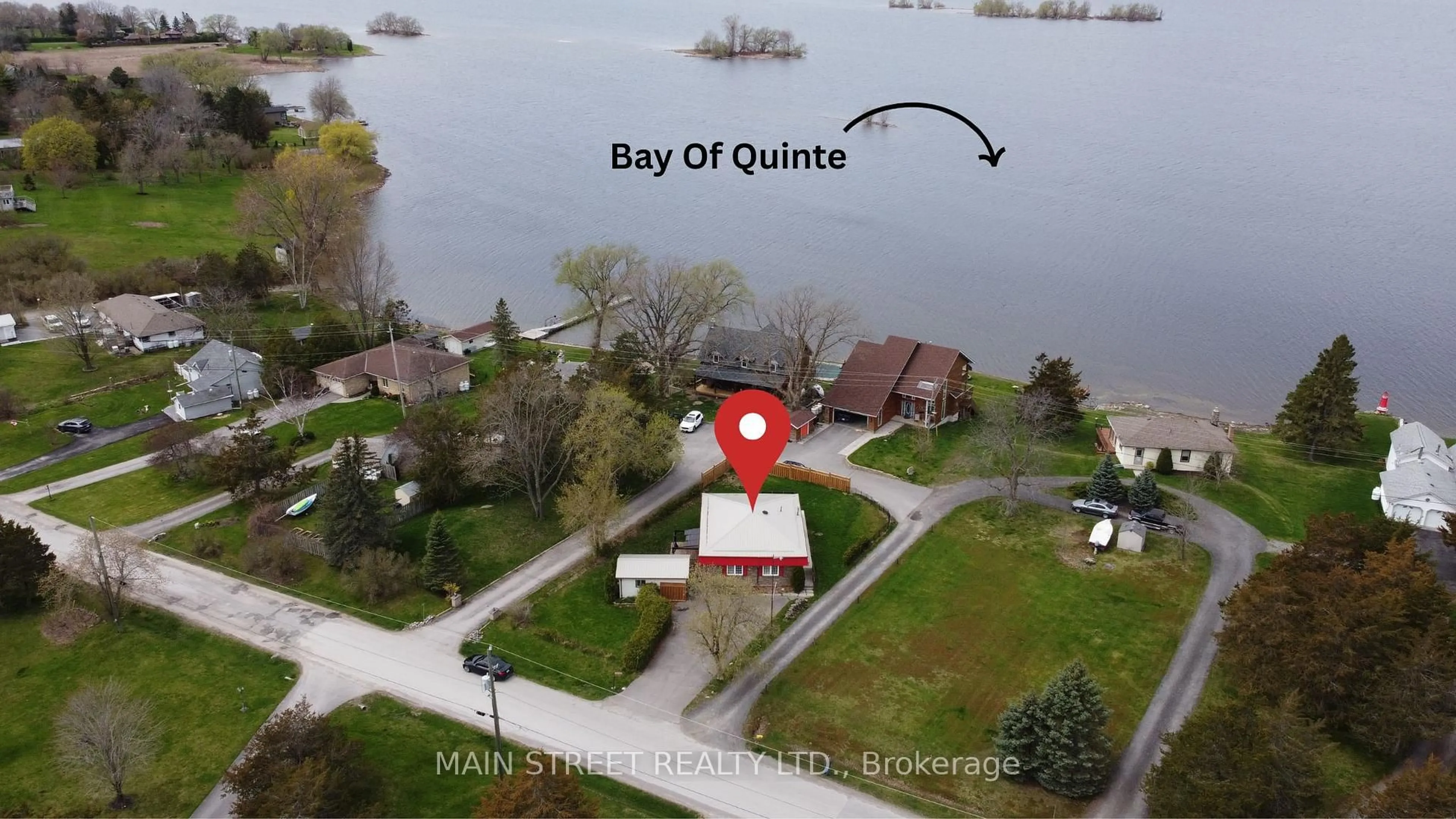 A pic from outside/outdoor area/front of a property/back of a property/a pic from drone, water/lake/river/ocean view for 35 Peats Point Rd, Prince Edward County Ontario K8N 4Z7