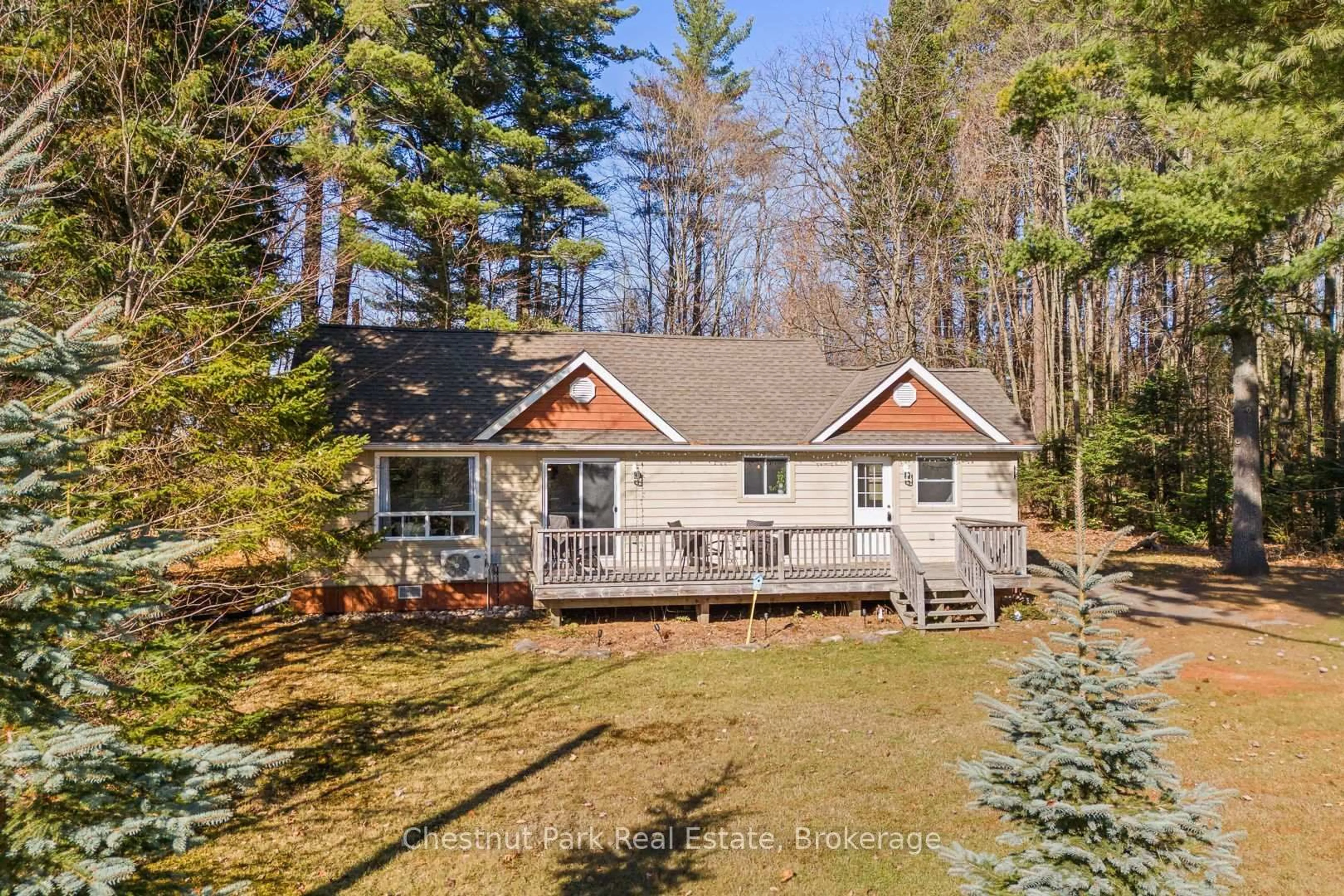 A pic from outside/outdoor area/front of a property/back of a property/a pic from drone, unknown for 39 Golf Course Rd, Huntsville Ontario P1H 1N7