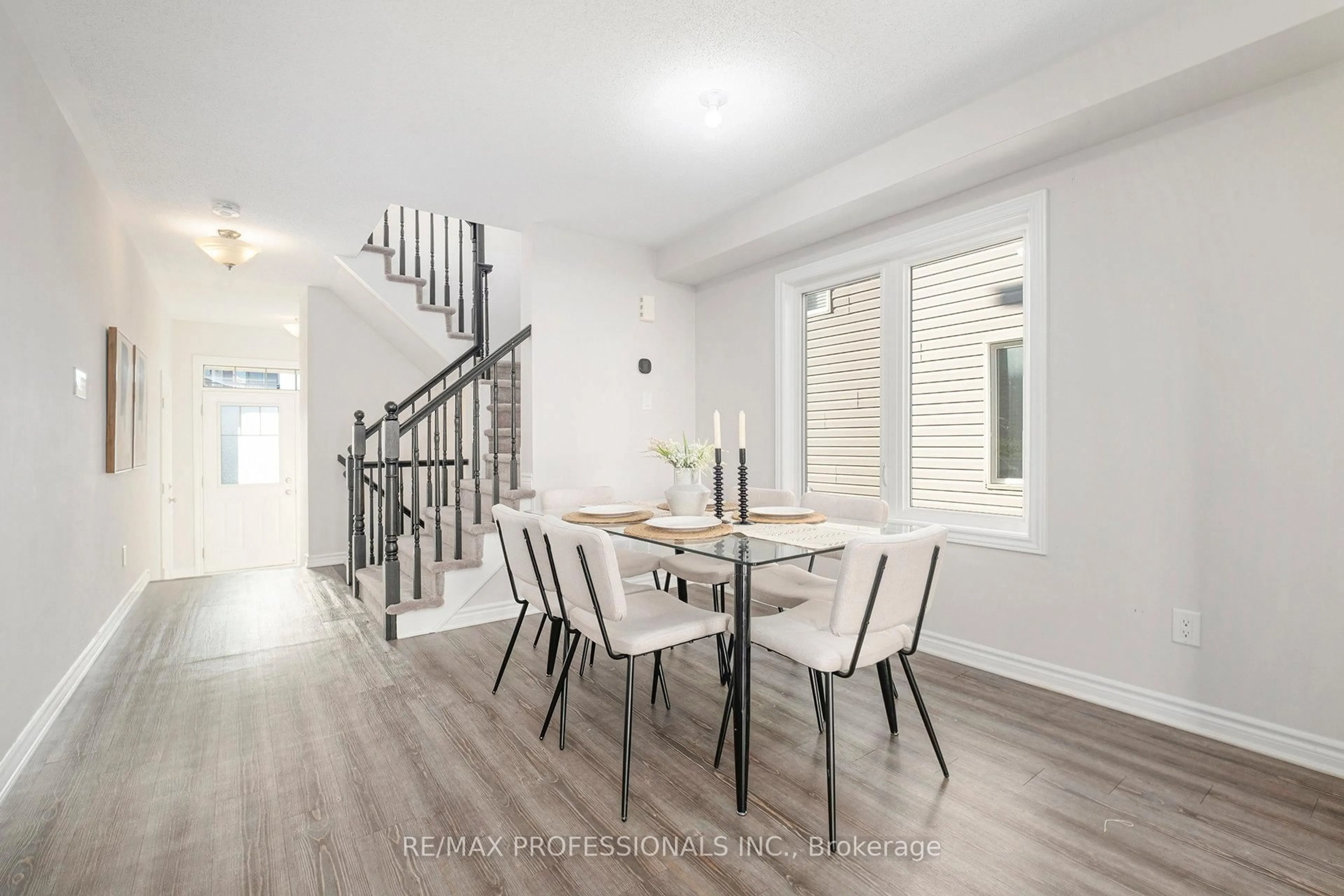 Dining room, wood/laminate floor for 2241 Watercolours Way, Ottawa Ontario K2J 6R2