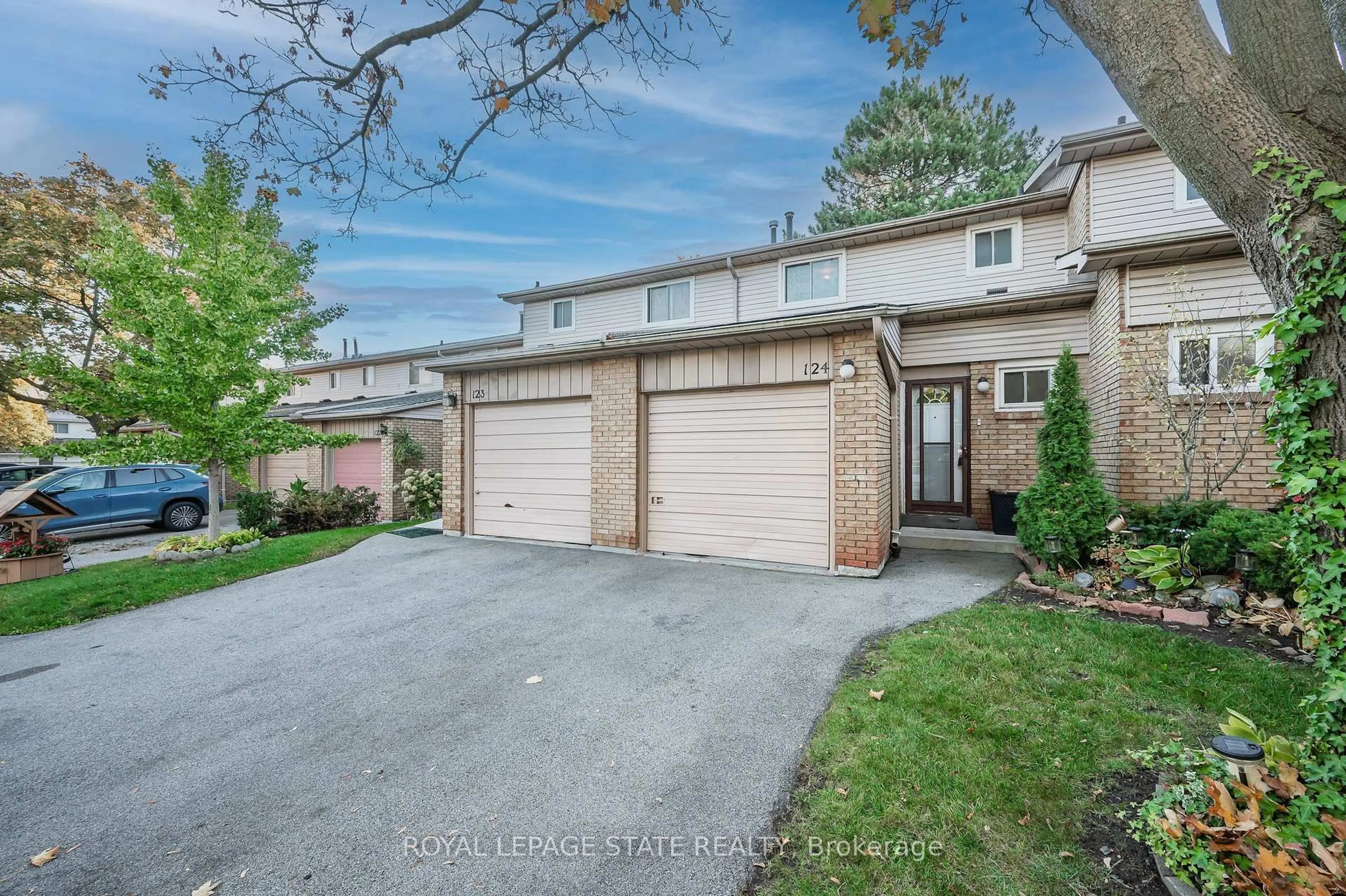 A pic from outside/outdoor area/front of a property/back of a property/a pic from drone, street for 100 Quigley Rd #124, Hamilton Ontario L8K 6J1