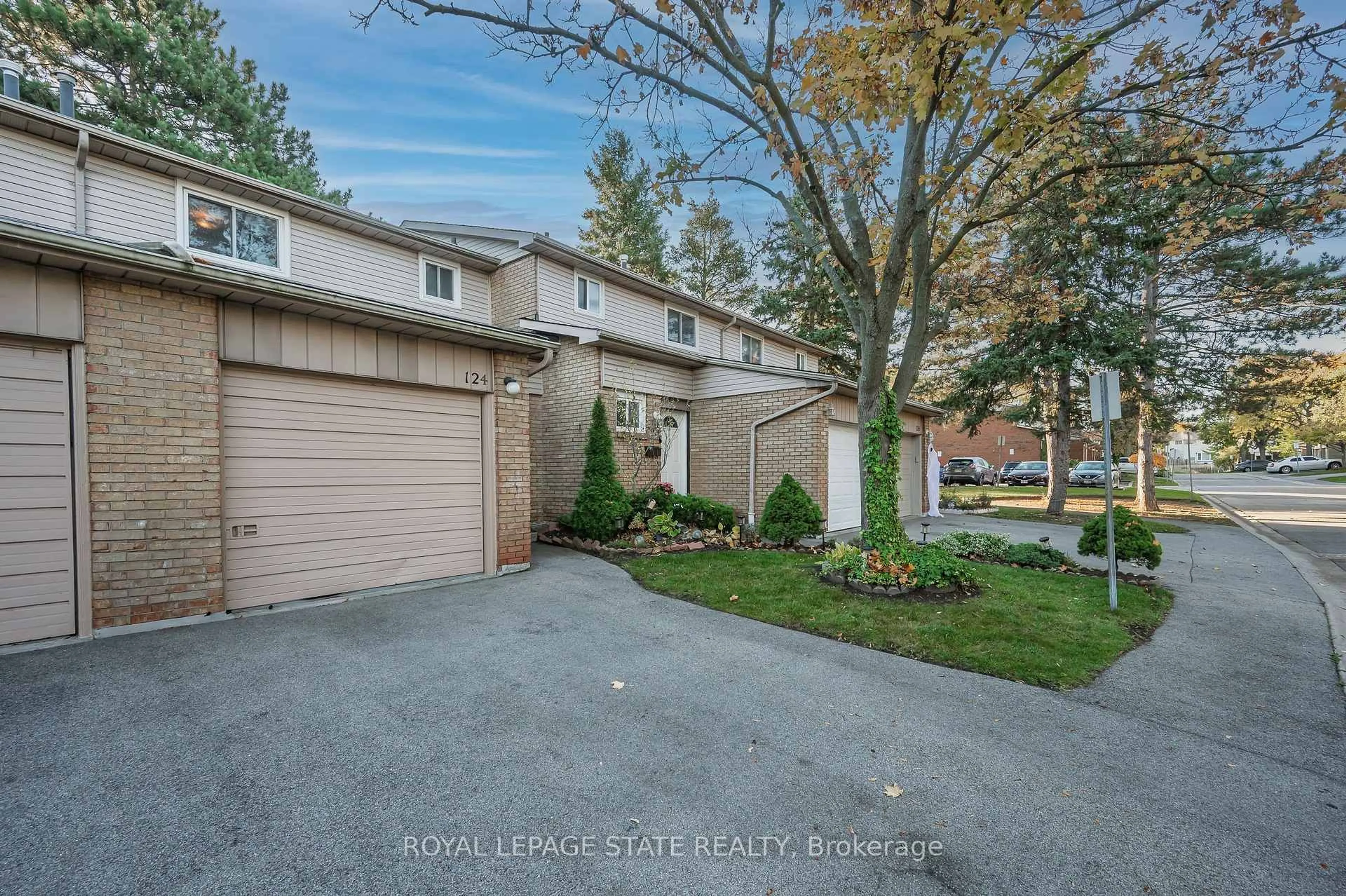 A pic from outside/outdoor area/front of a property/back of a property/a pic from drone, street for 100 Quigley Rd #124, Hamilton Ontario L8K 6J1