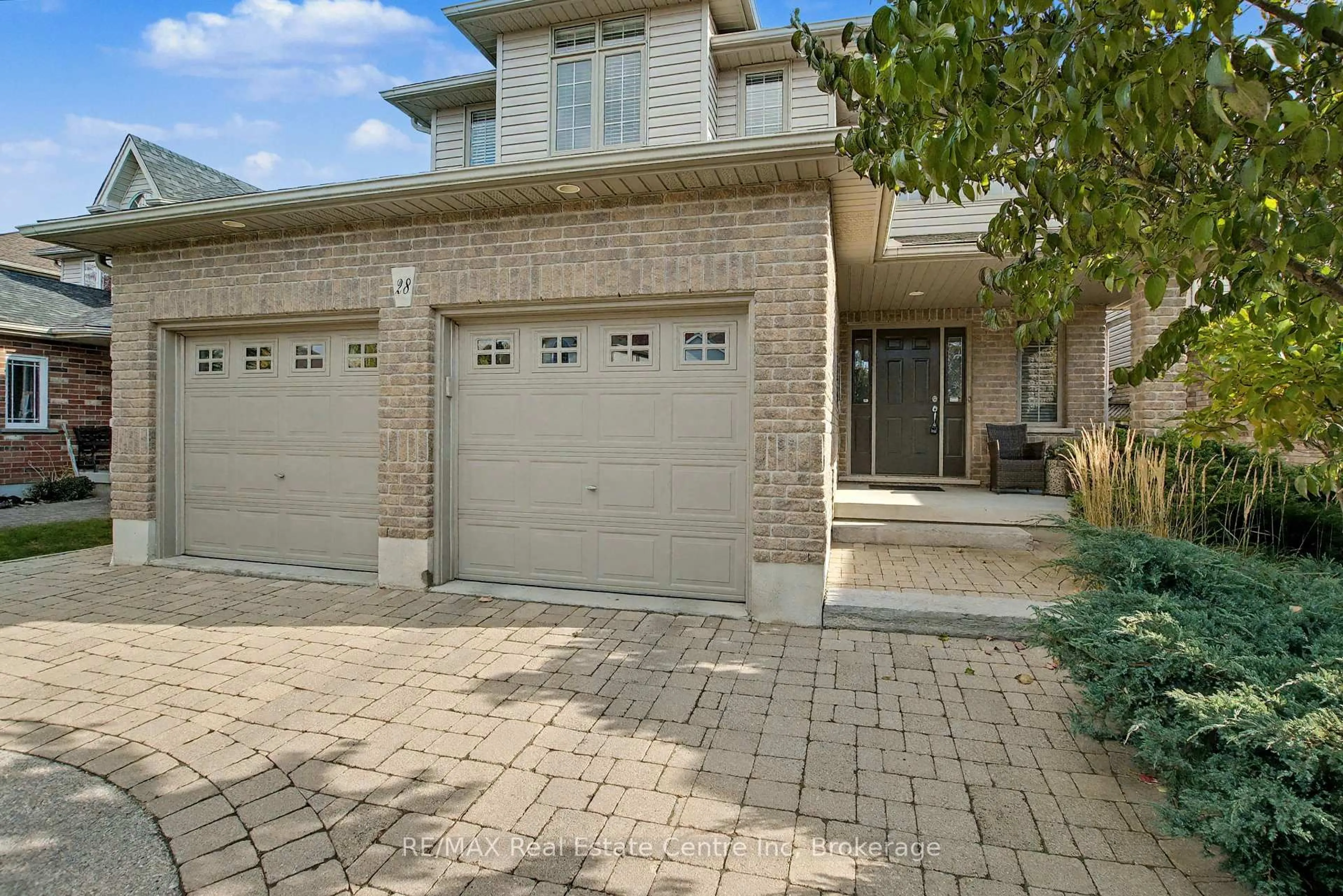 Home with brick exterior material, street for 28 Irving Cres, Guelph Ontario N1G 5J1