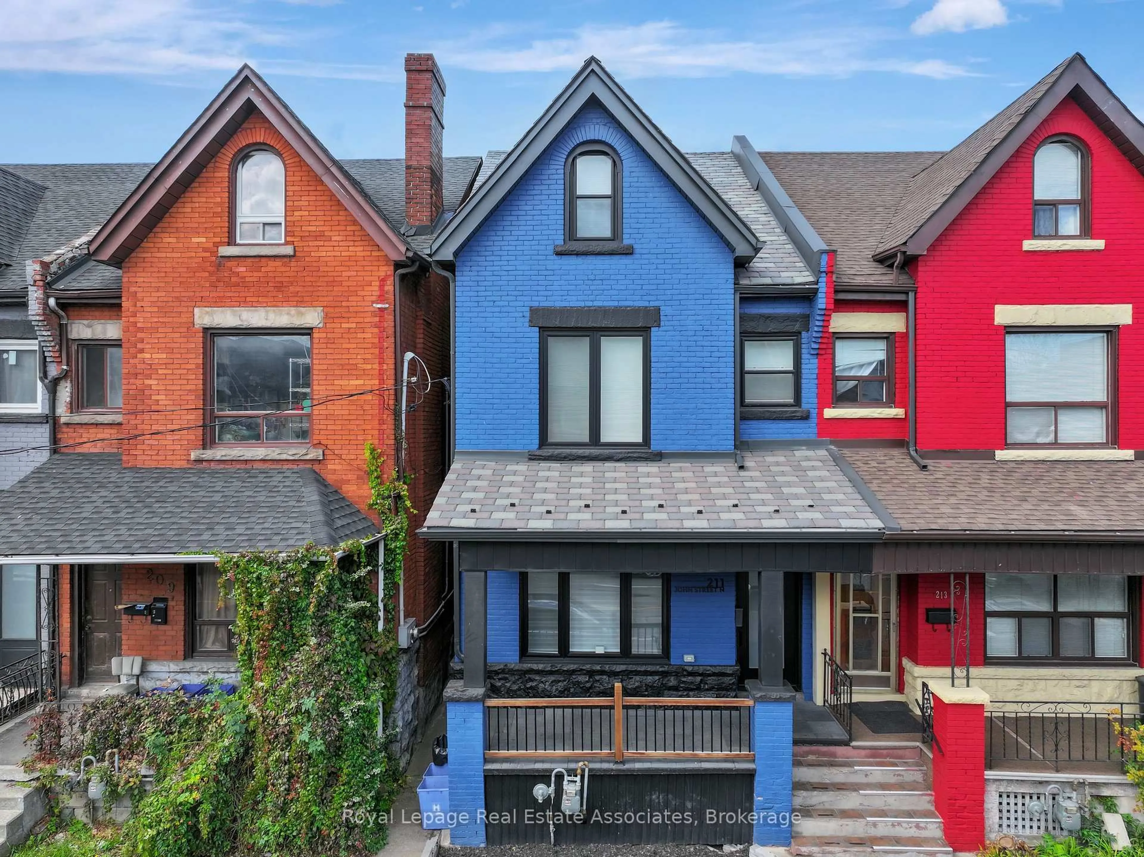 Home with brick exterior material, street for 211 John St, Hamilton Ontario L8L 4P4