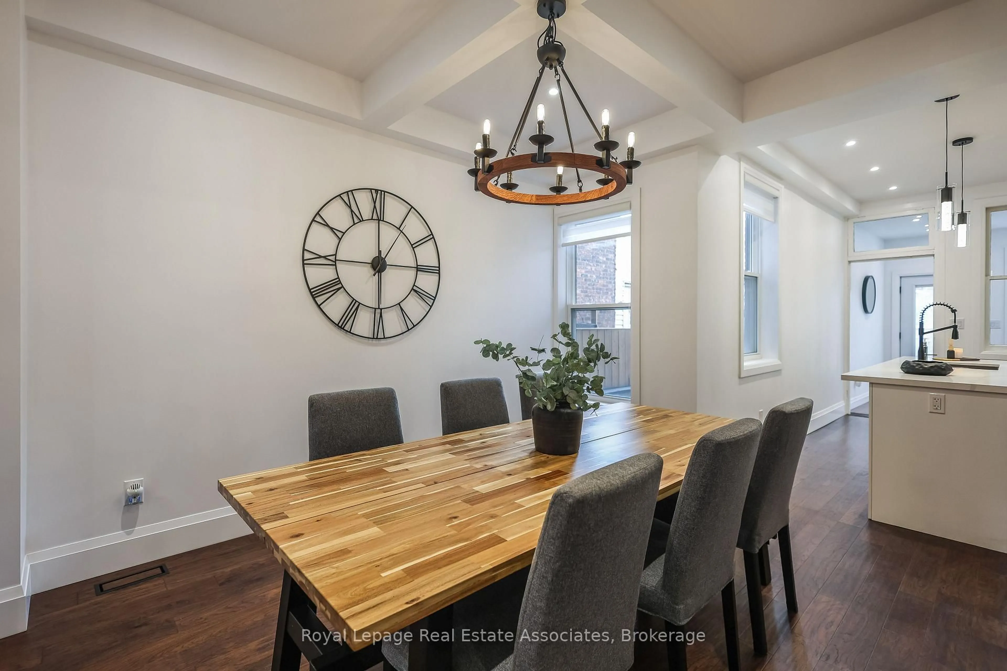 Dining room, wood/laminate floor for 211 John St, Hamilton Ontario L8L 4P4