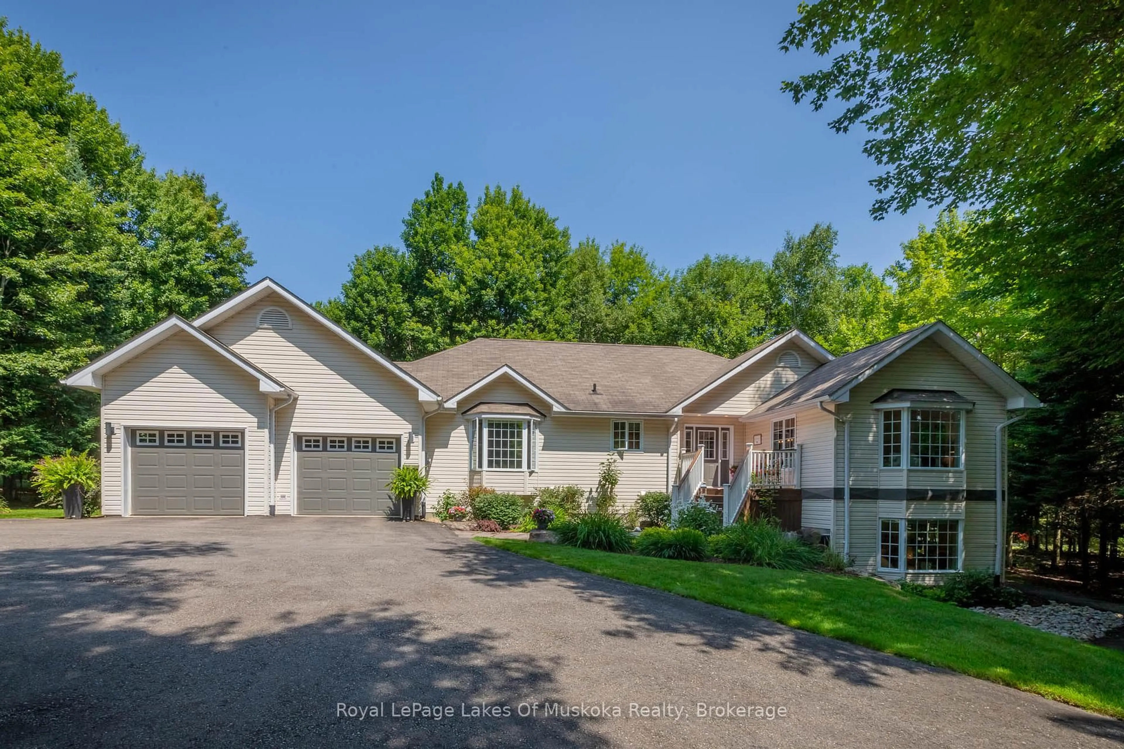 A pic from outside/outdoor area/front of a property/back of a property/a pic from drone, water/lake/river/ocean view for 24 BIRCHWOOD Cres, Huntsville Ontario P1H 0A6