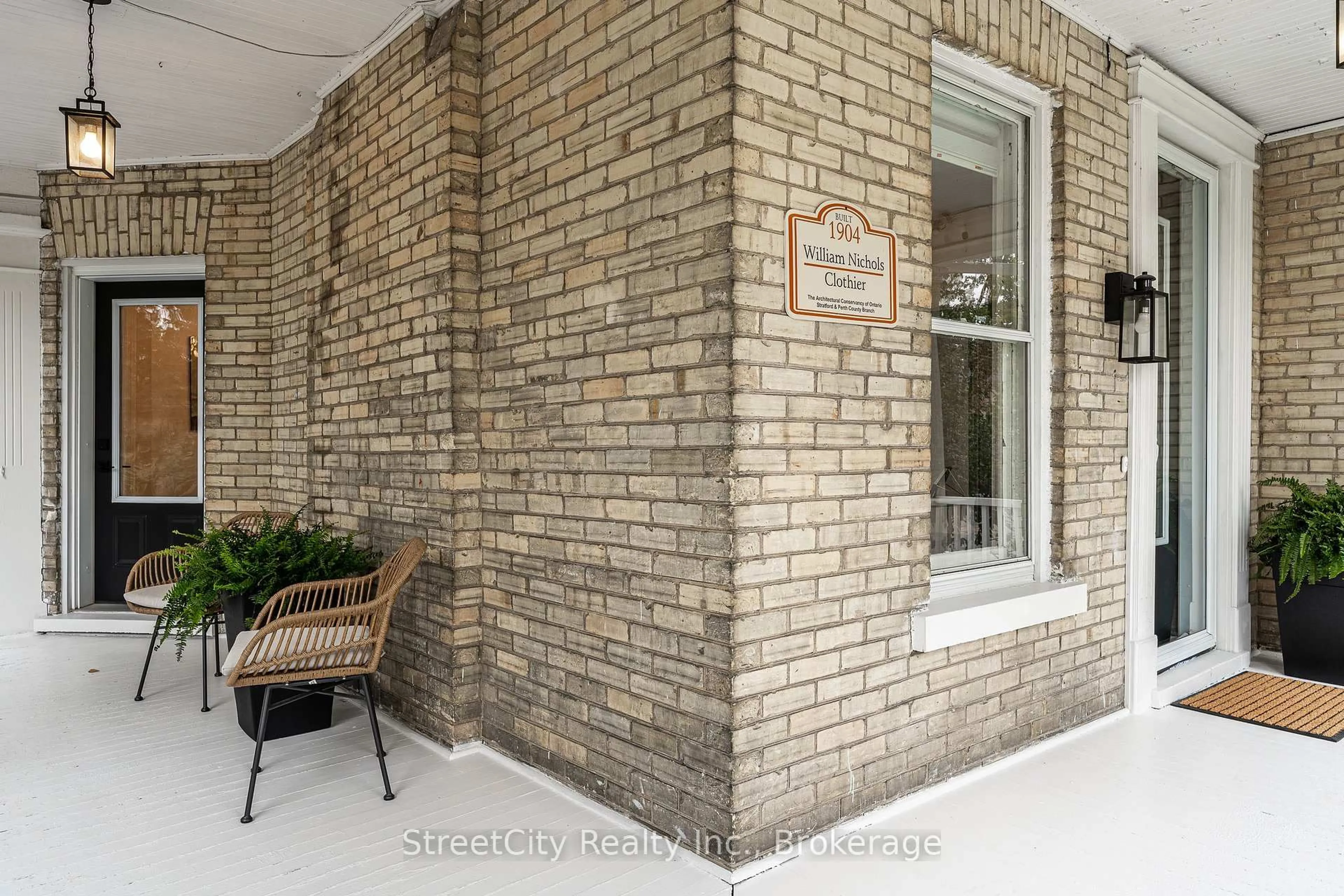 Home with brick exterior material, street for 18 Waterloo St, Stratford Ontario N5A 5H5