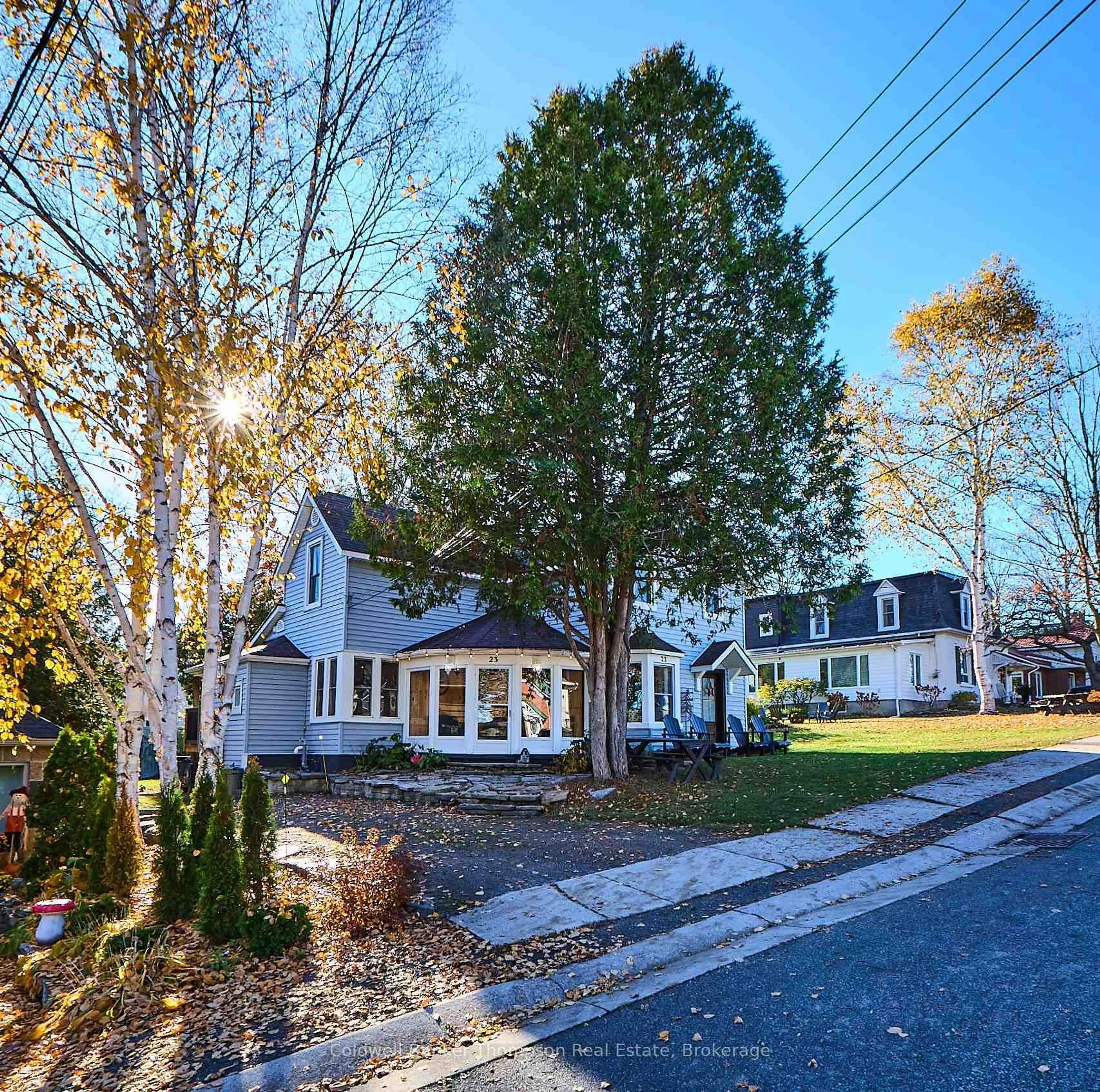 Home with vinyl exterior material, street for 23 Fairy Ave, Huntsville Ontario P1H 1G7