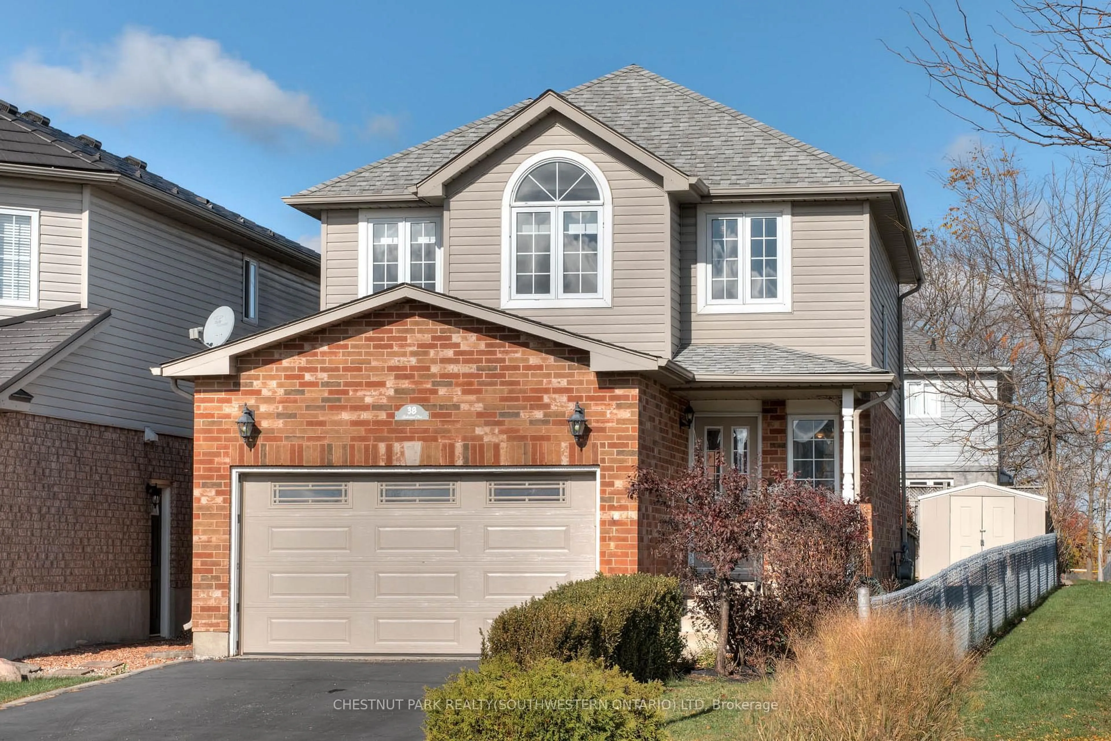 Home with brick exterior material, street for 38 Heatherwood Pl, Kitchener Ontario N2N 3P4