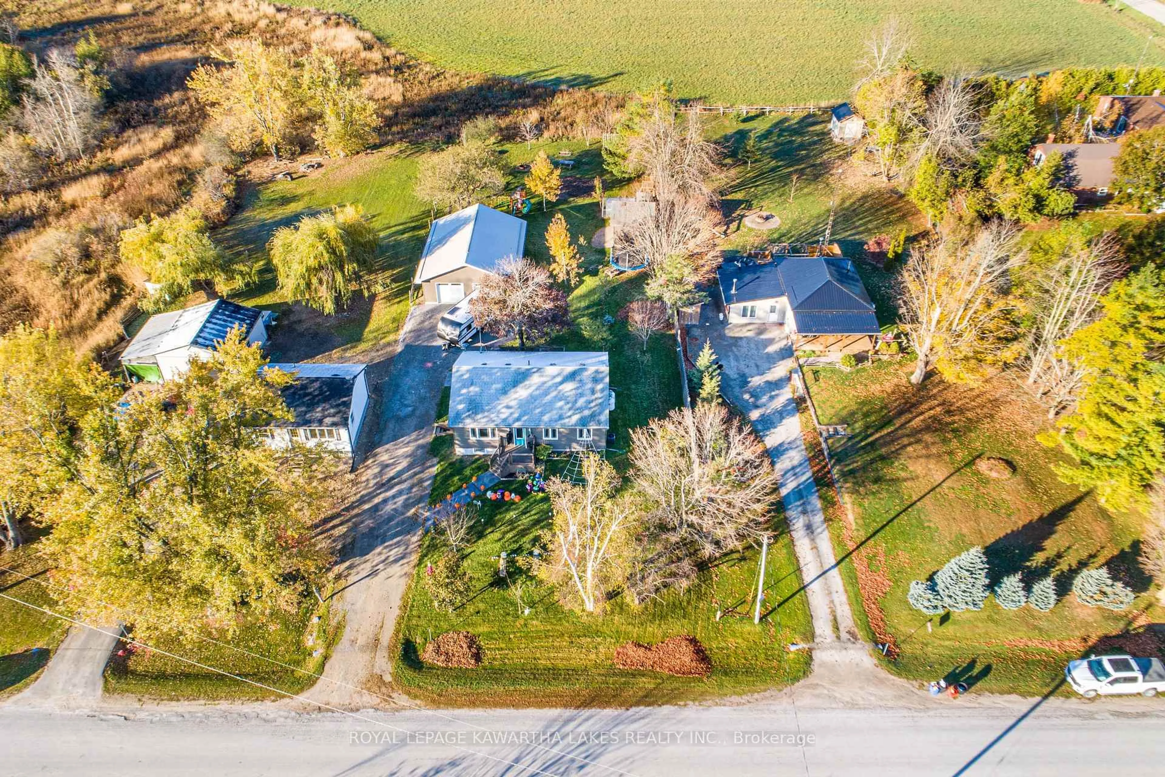 A pic from outside/outdoor area/front of a property/back of a property/a pic from drone, street for 297 Hartley Rd, Kawartha Lakes Ontario K0M 2T0
