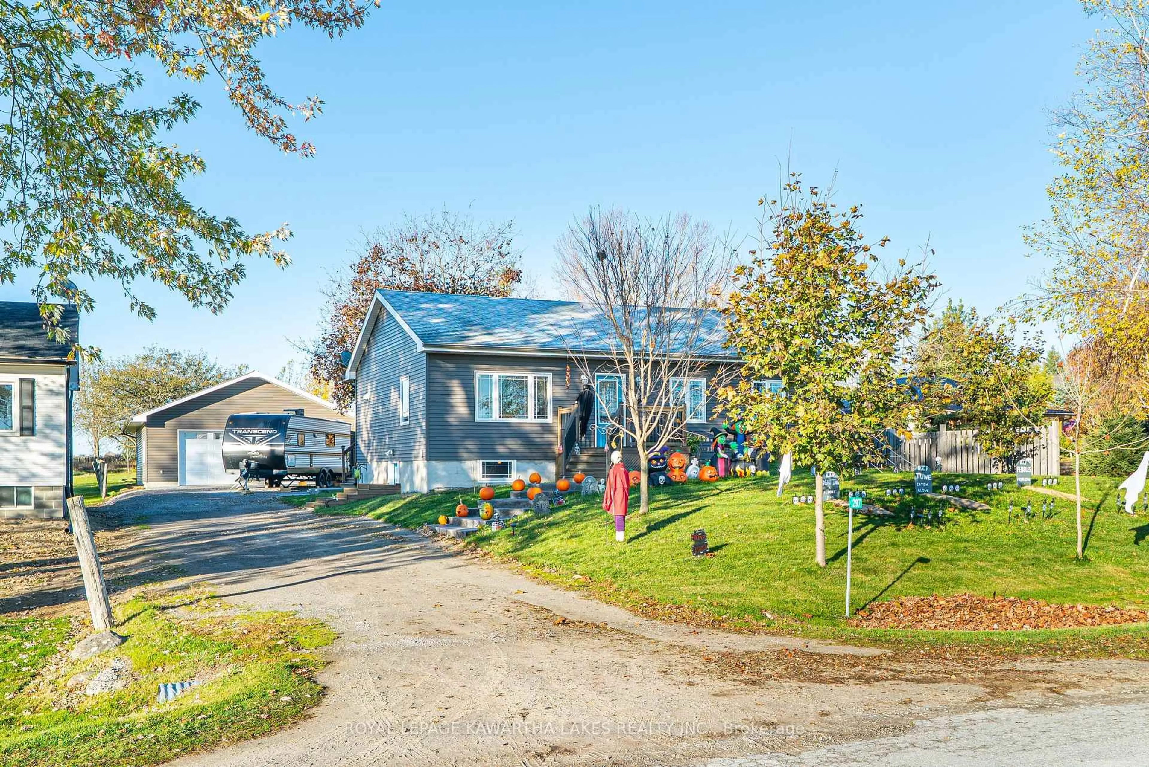 A pic from outside/outdoor area/front of a property/back of a property/a pic from drone, street for 297 Hartley Rd, Kawartha Lakes Ontario K0M 2T0