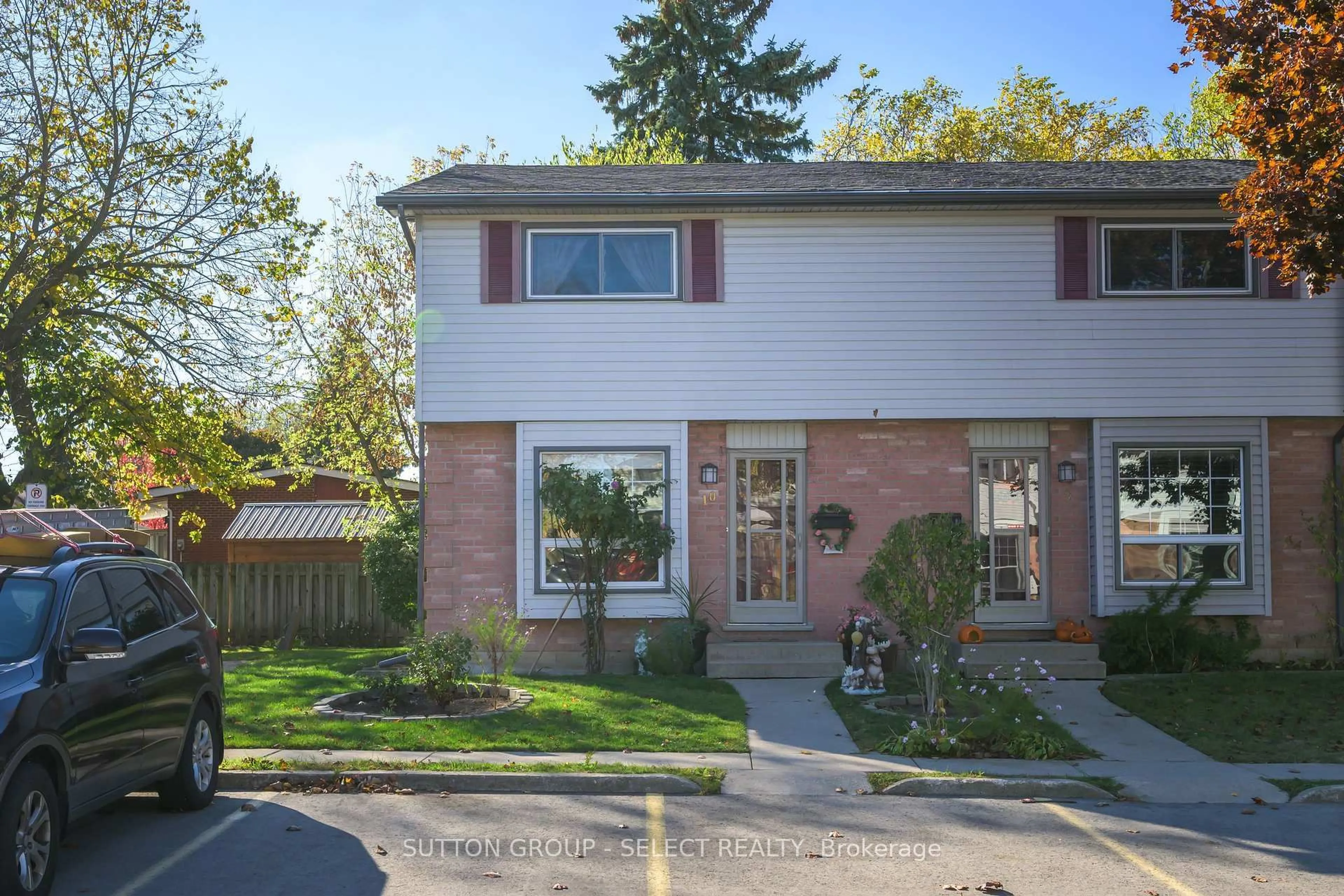 Home with brick exterior material, street for 1215 Cheapside St #10, London East Ontario N5Y 5J9