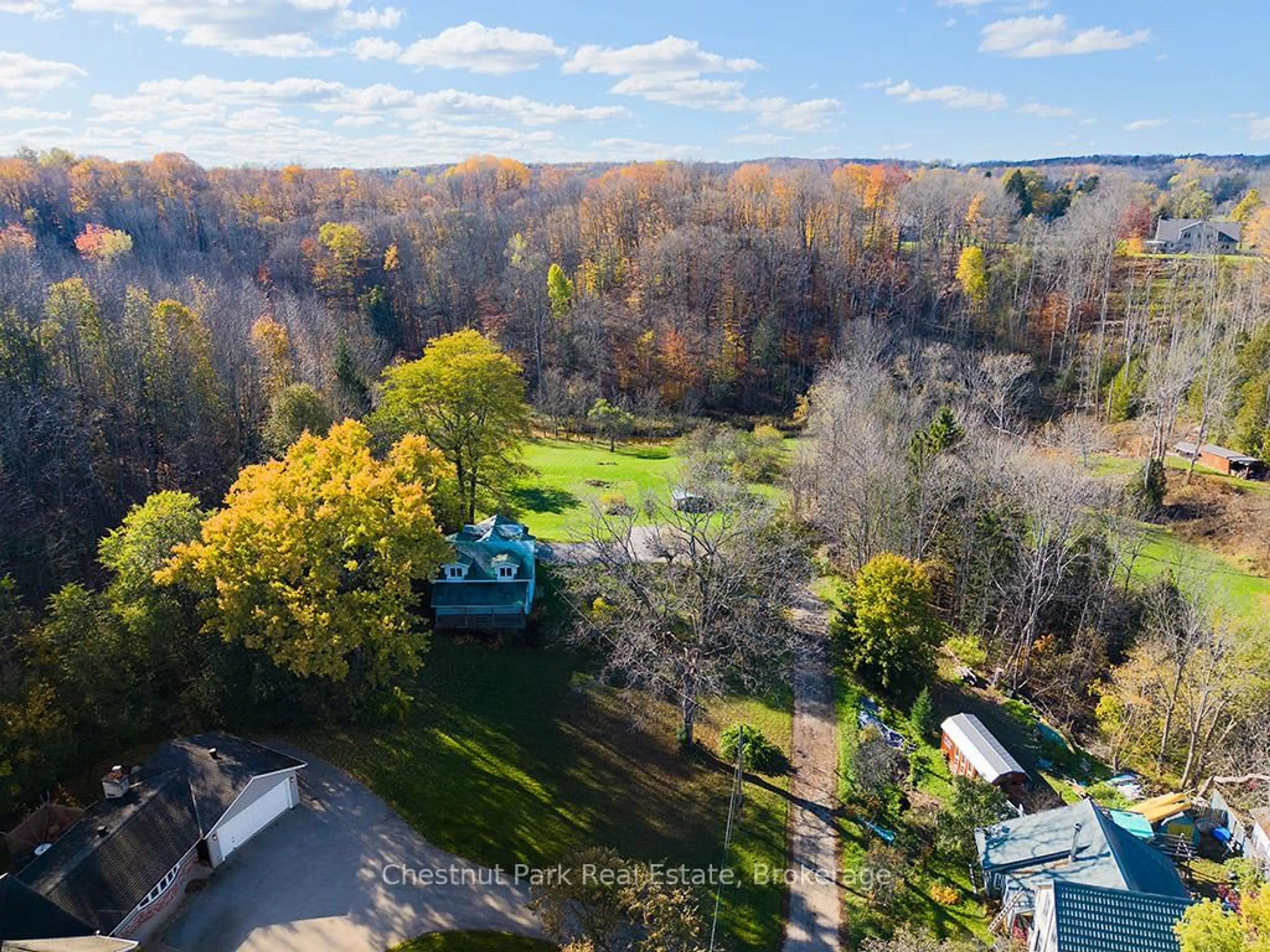 A pic from outside/outdoor area/front of a property/back of a property/a pic from drone, forest/trees view for 675 14th St, Owen Sound Ontario N4K 3Y5