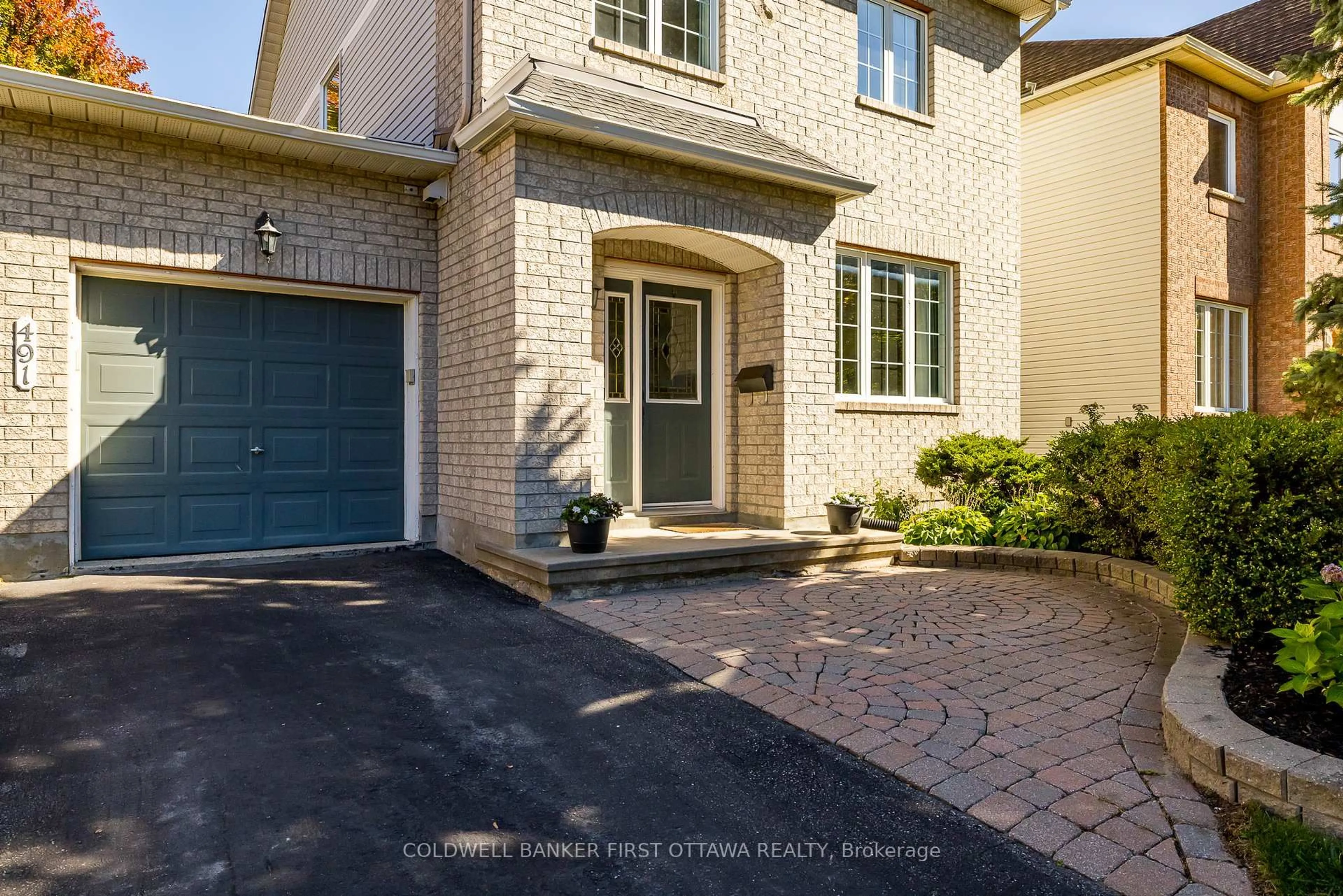 Home with brick exterior material, street for 491 MEADOWBREEZE Dr, Ottawa Ontario K2M 2T6