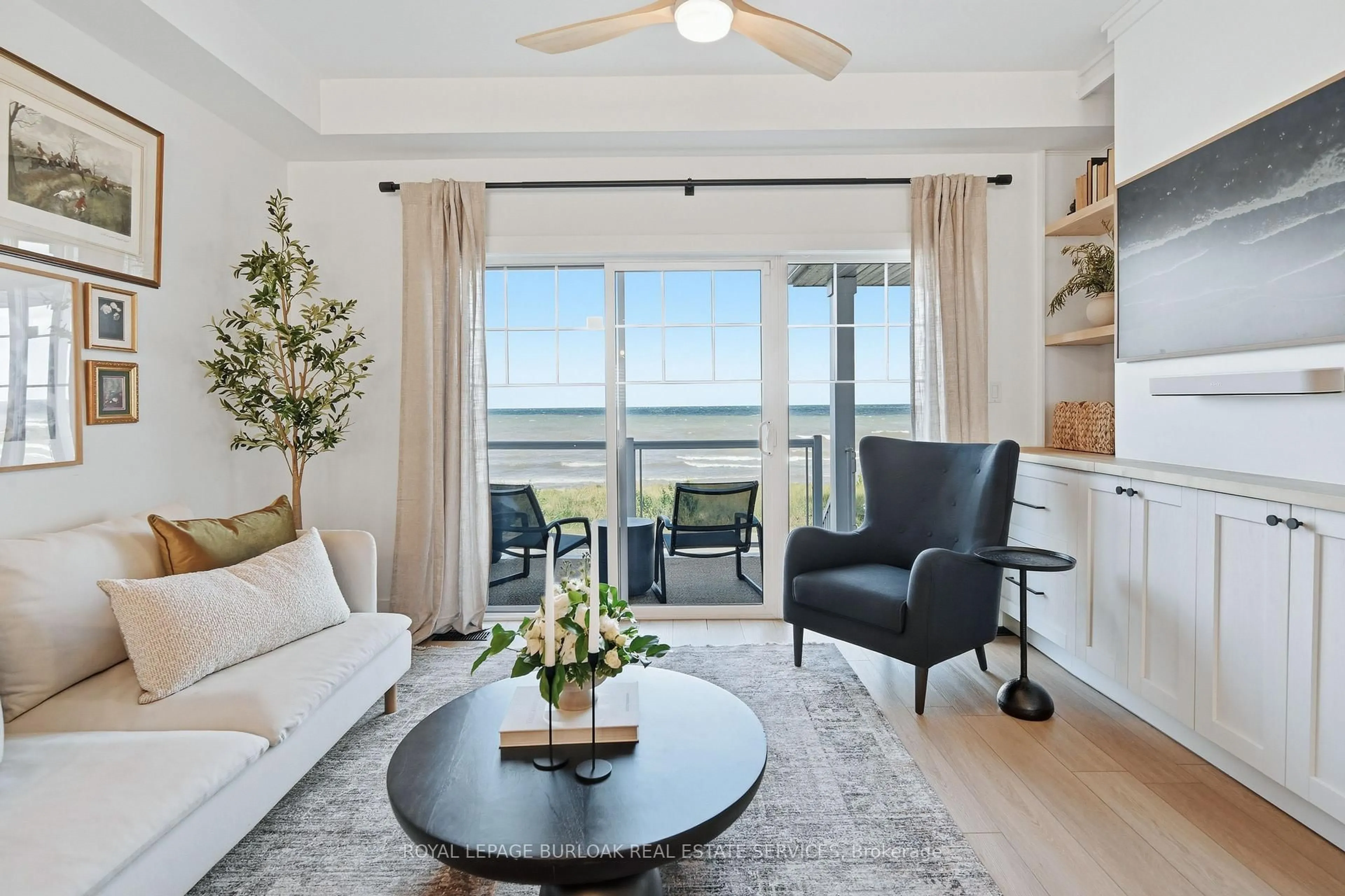 Living room with furniture, wood/laminate floor for 337 Beach Blvd #7, Hamilton Ontario L8H 6W4