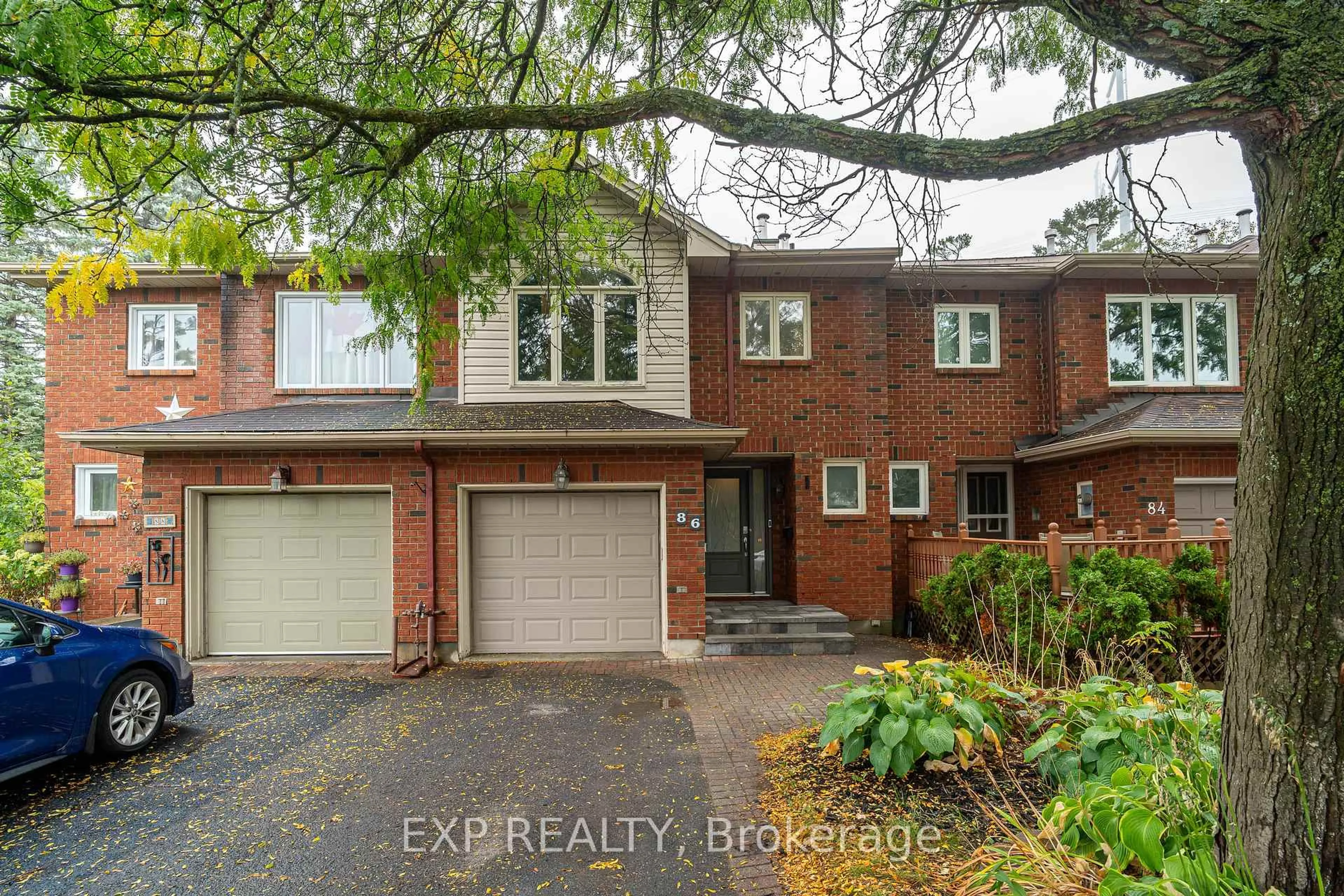 Home with brick exterior material, street for 86 Furlong Cres, Ottawa Ontario K2M 2H9