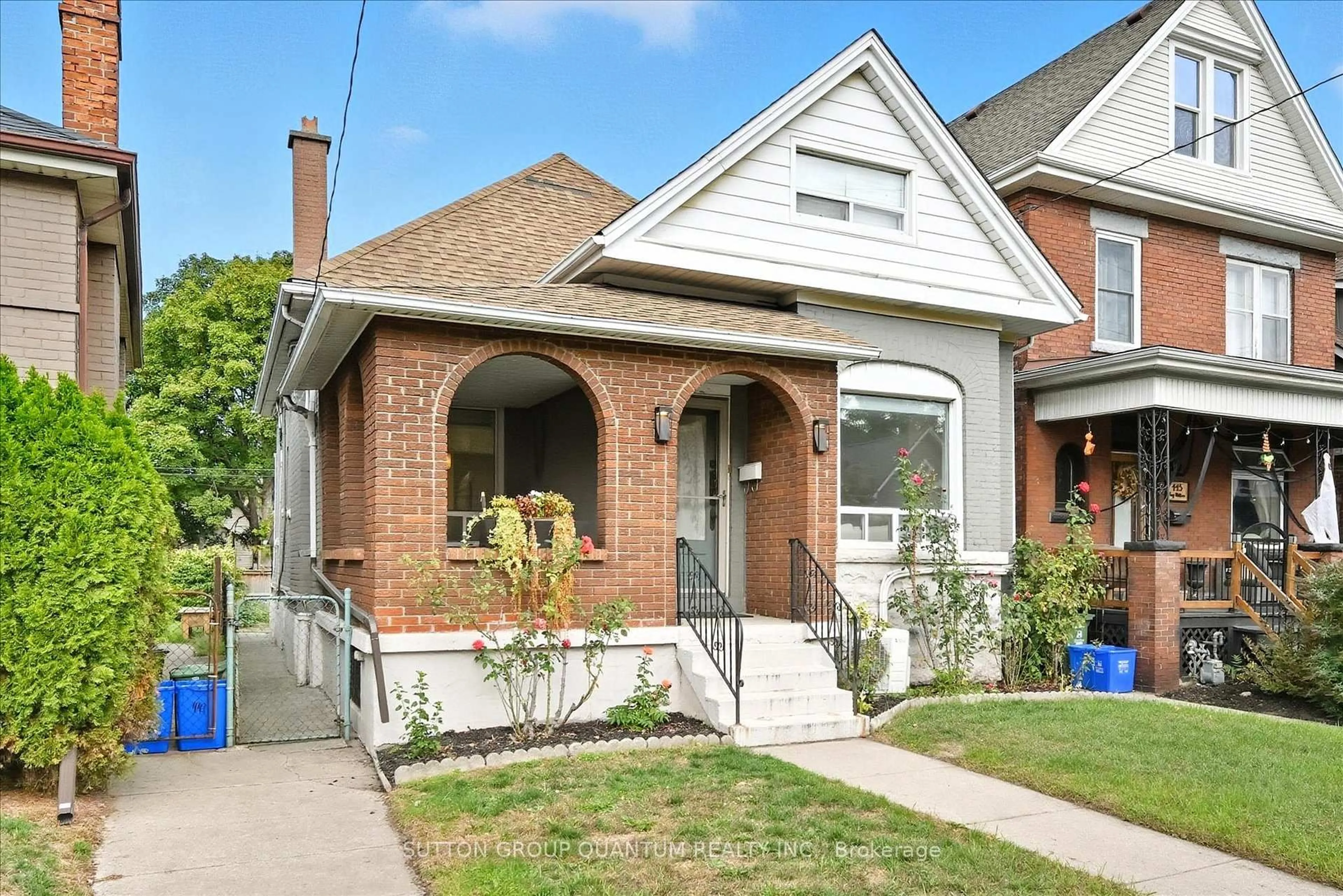 Home with brick exterior material, street for 443 King William St, Hamilton Ontario L8L 1R1