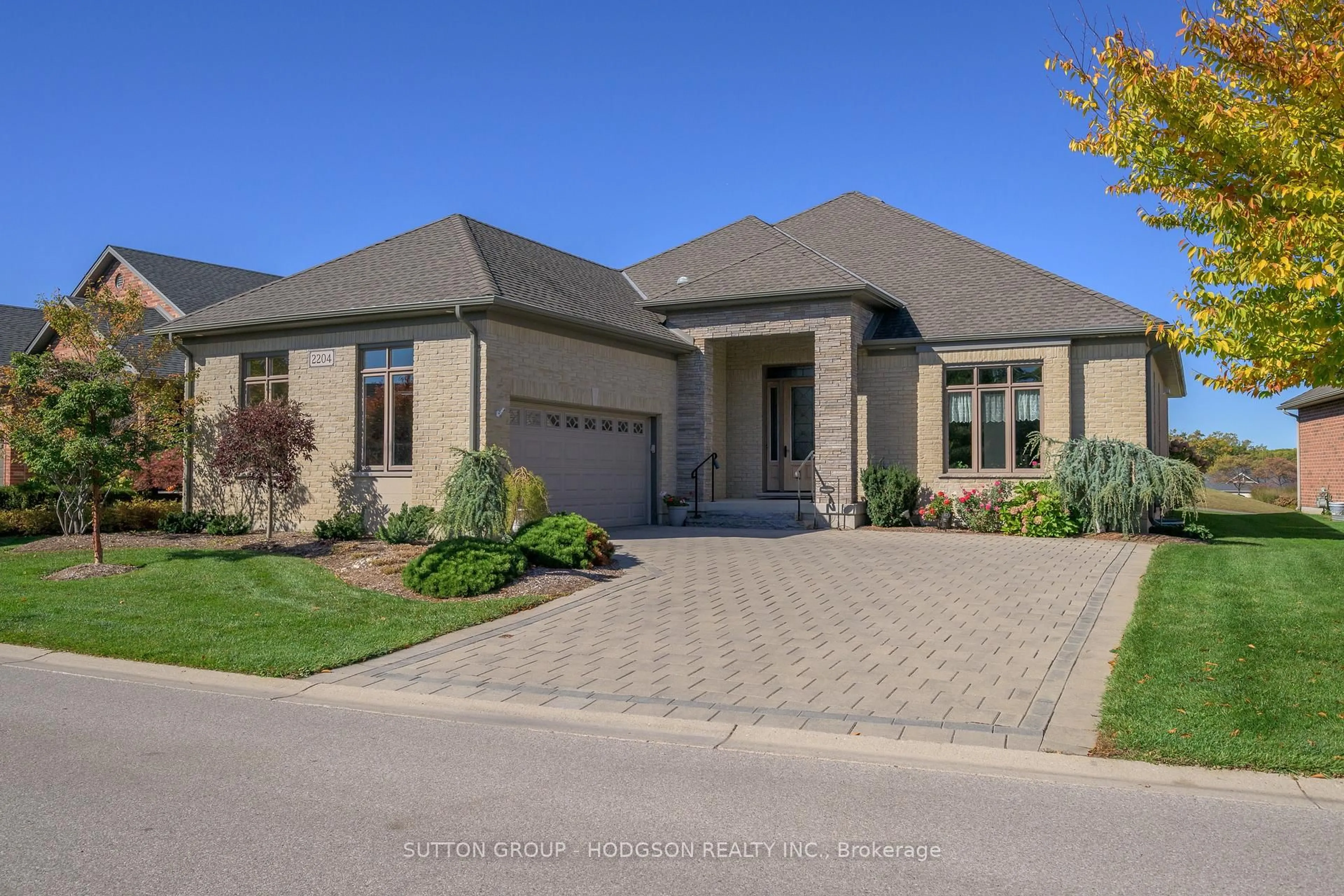 Home with brick exterior material, street for 2204 Jack Nash Dr, London South Ontario N6K 5R3