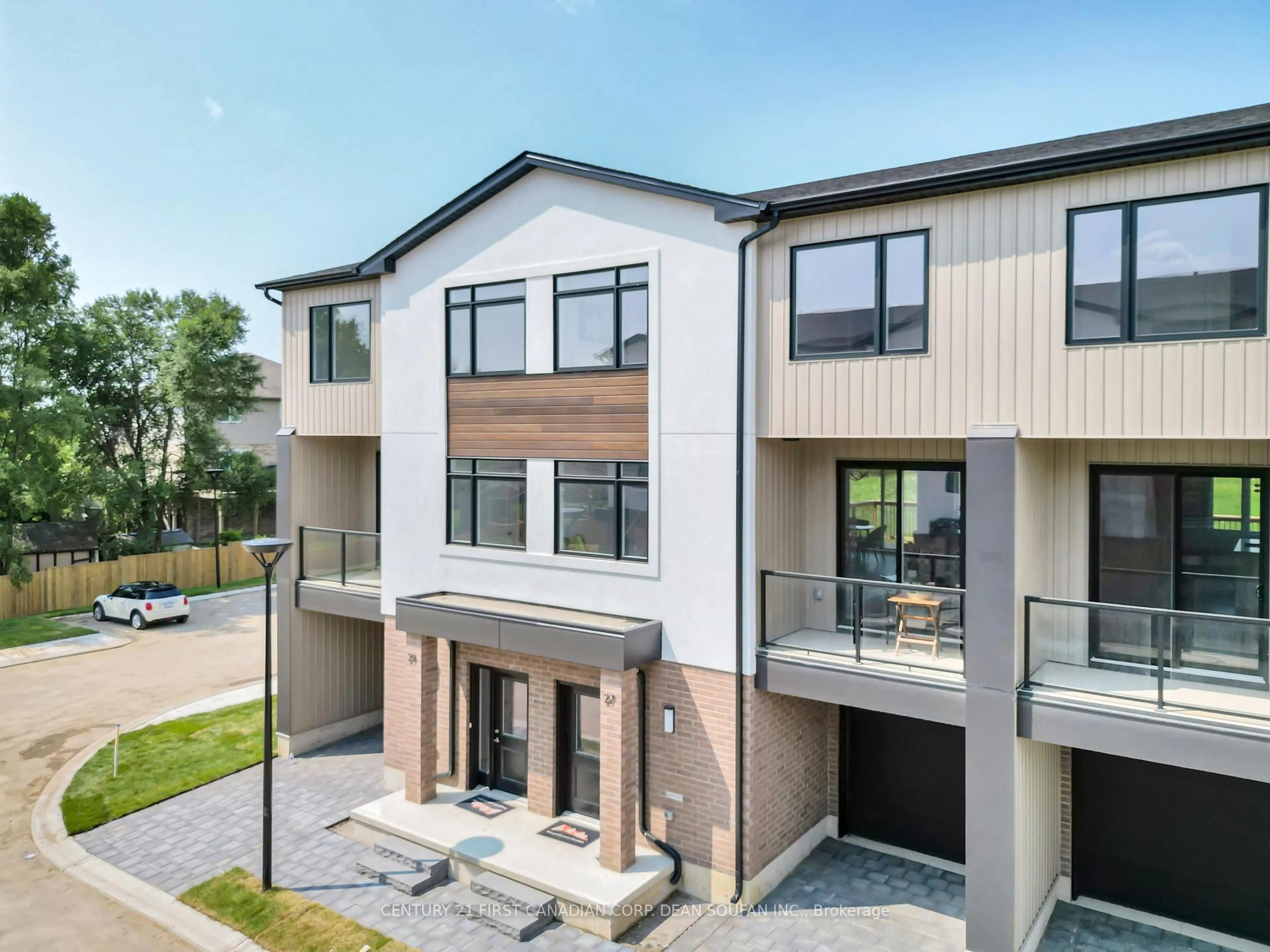 A pic from outside/outdoor area/front of a property/back of a property/a pic from drone, unknown for 349 Southdale Rd #22, London South Ontario N6E 0B9