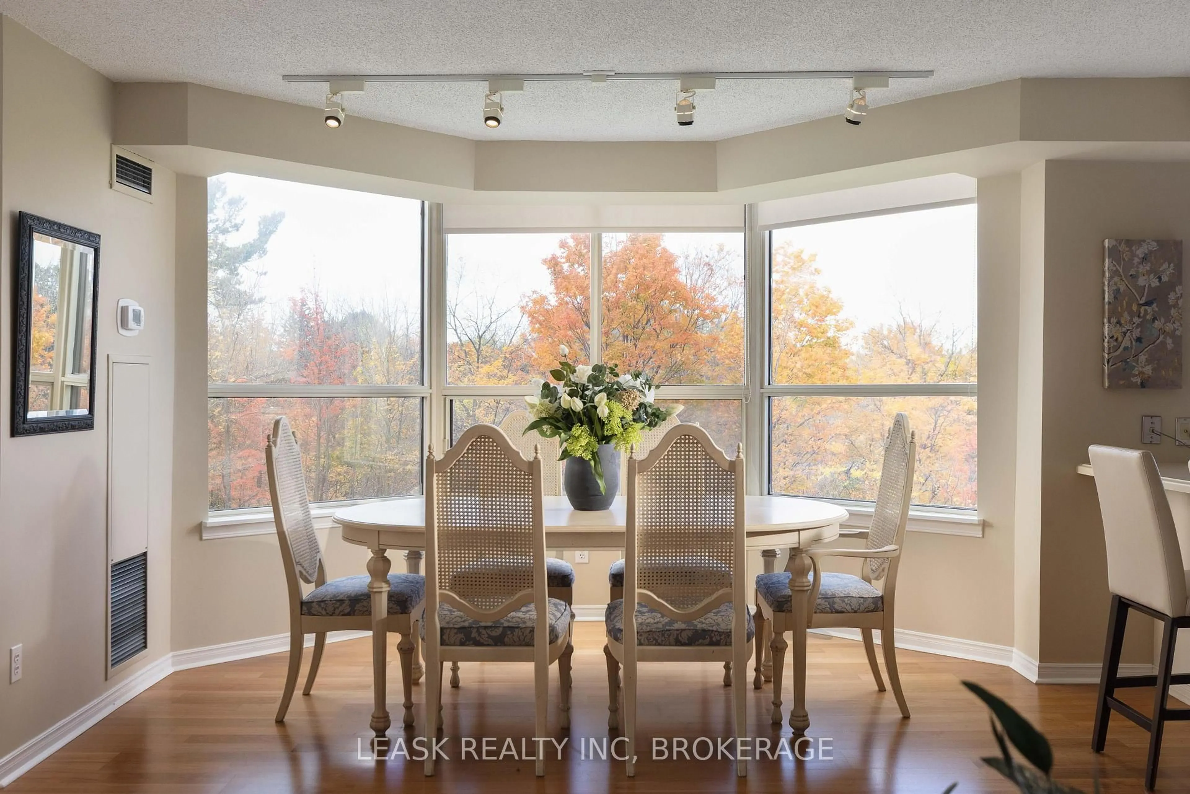 Dining room, wood/laminate floor for 3 Towering Heights Blvd #303, St. Catharines Ontario L2T 4A4