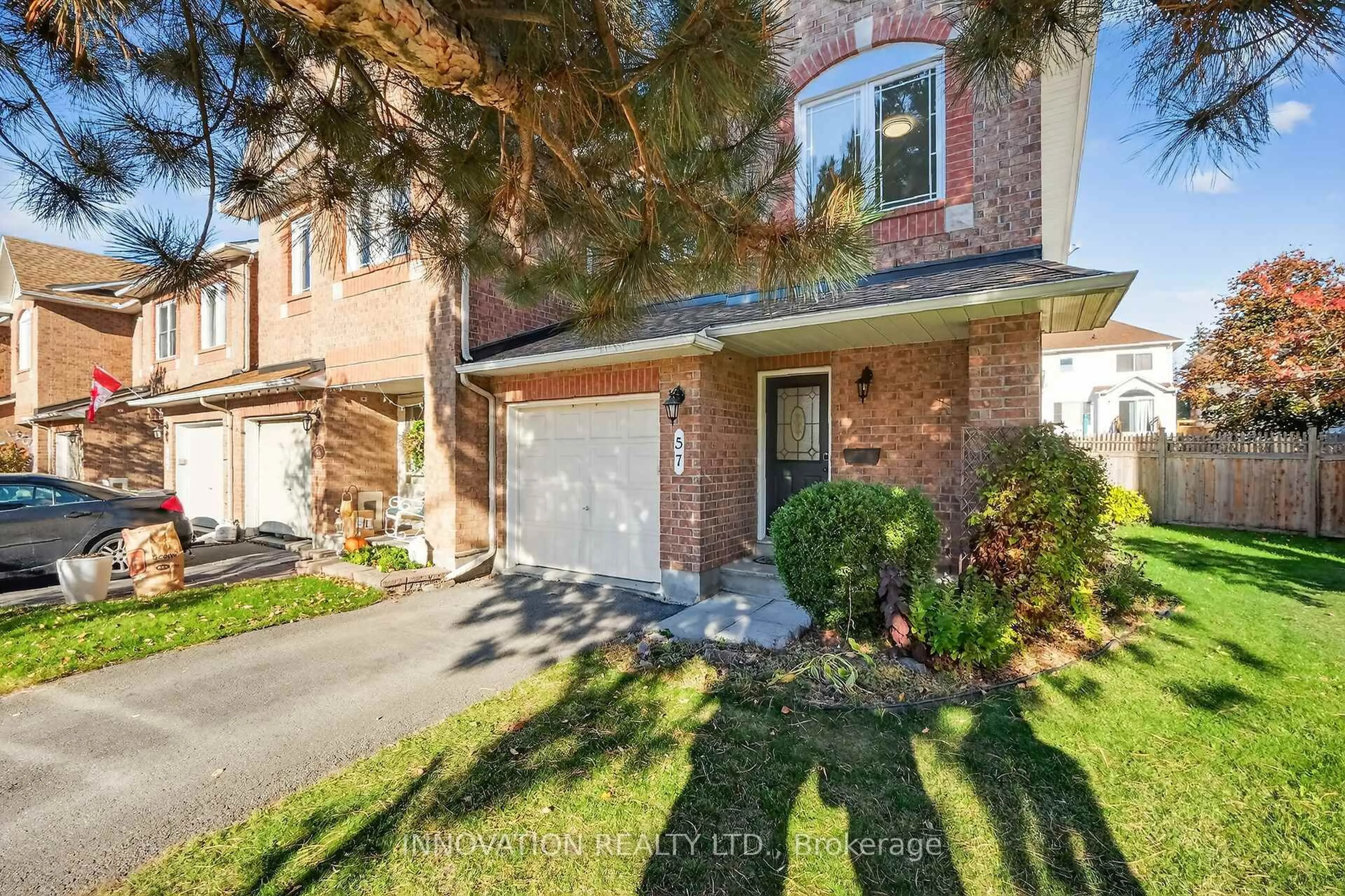 Home with brick exterior material, street for 57 Flowertree Cres, Ottawa Ontario K2M 2R7