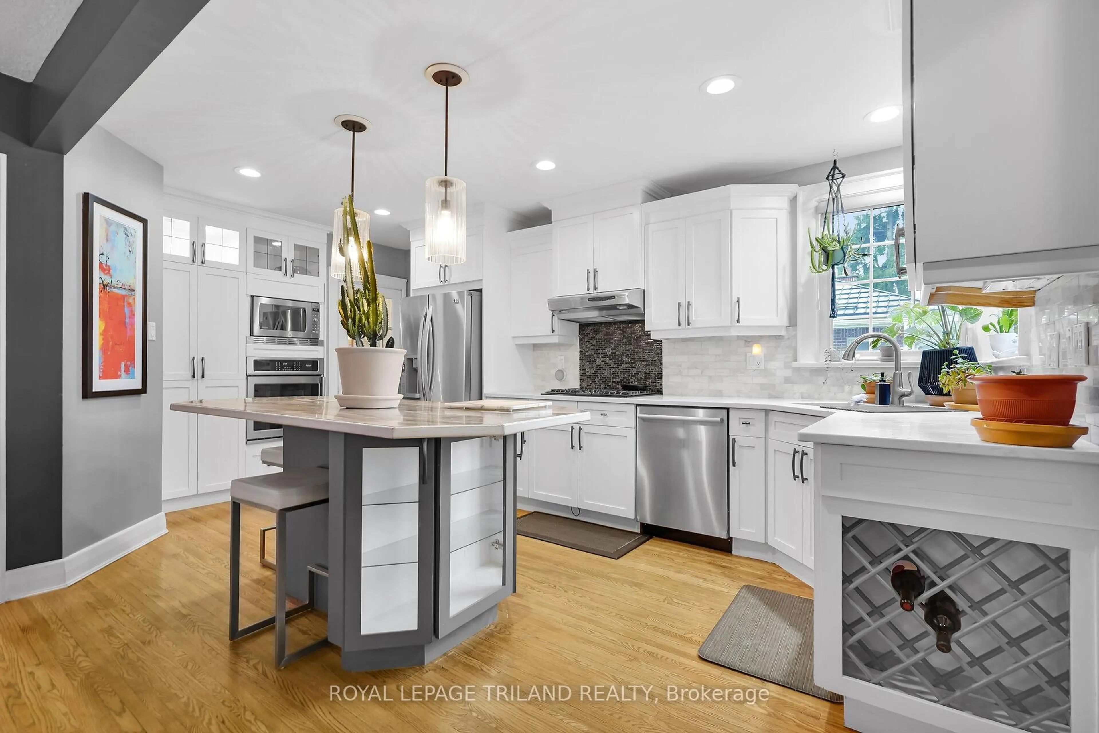 Open concept kitchen, ceramic/tile floor for 87 Iroquois Ave, London South Ontario N6C 2K7