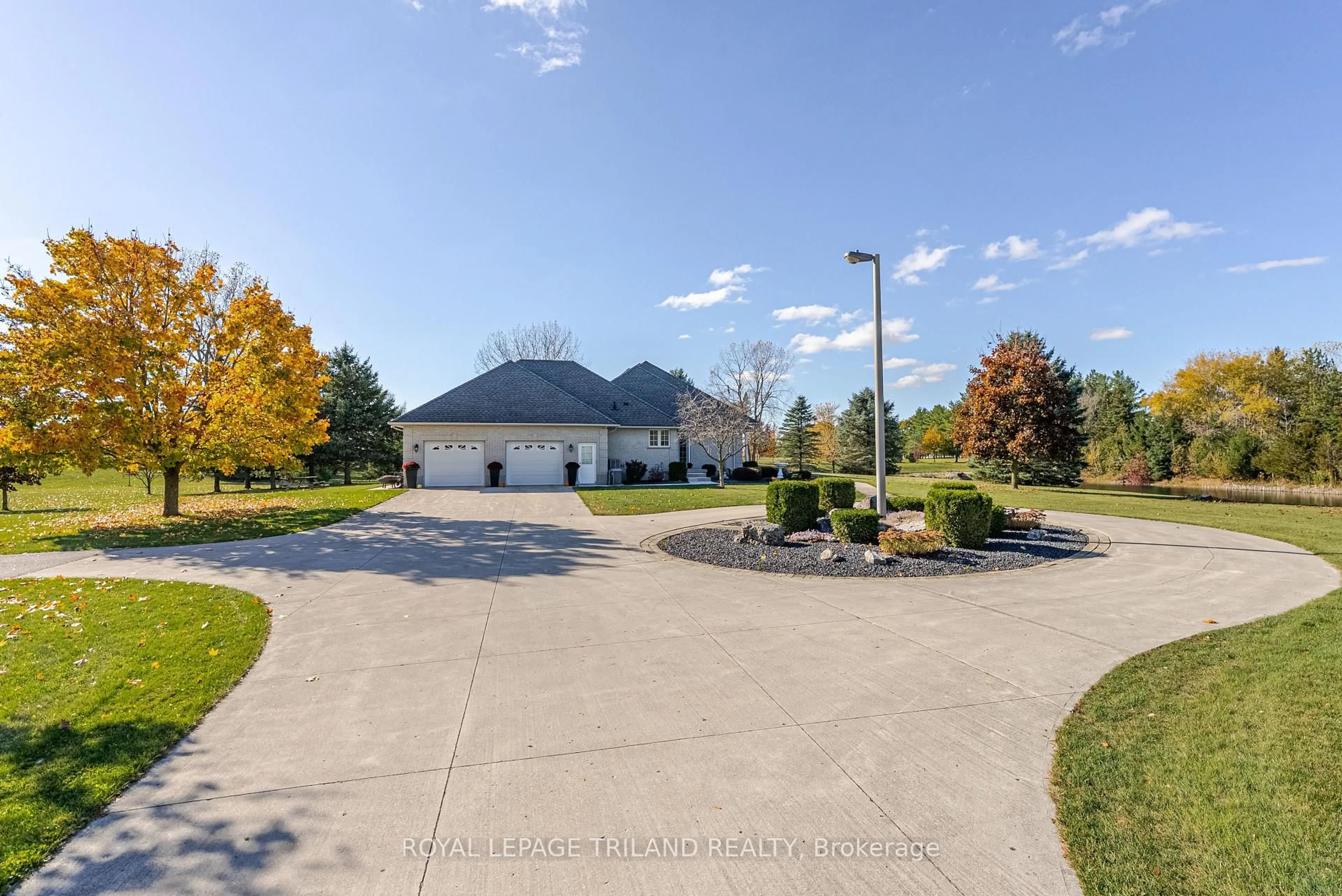 A pic from outside/outdoor area/front of a property/back of a property/a pic from drone, street for 5017 Hamilton Rd, Thames Centre Ontario N0L 1G6