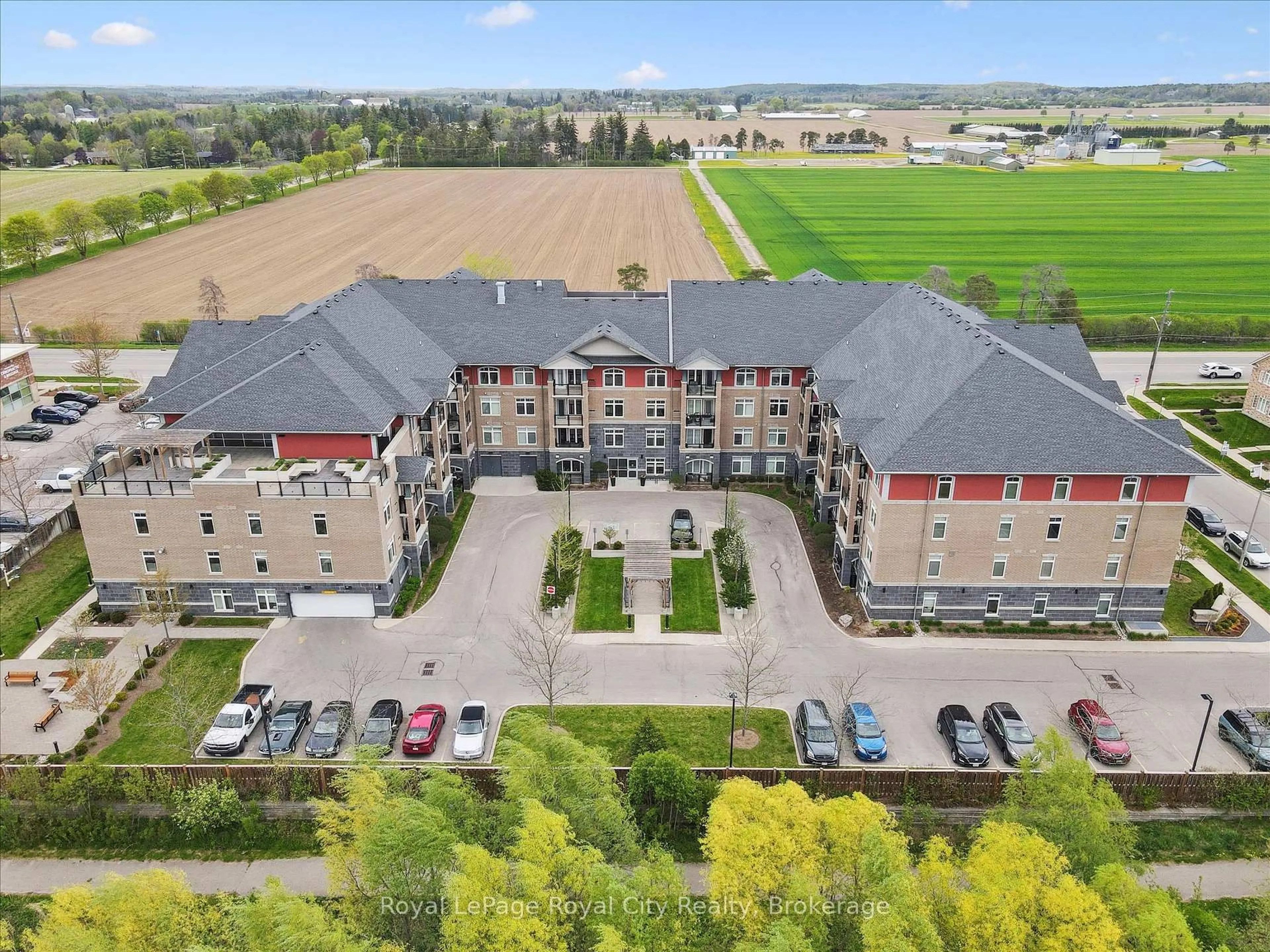 A pic from outside/outdoor area/front of a property/back of a property/a pic from drone, unknown for 106 Bard Blvd #202, Guelph Ontario N1L 0L8