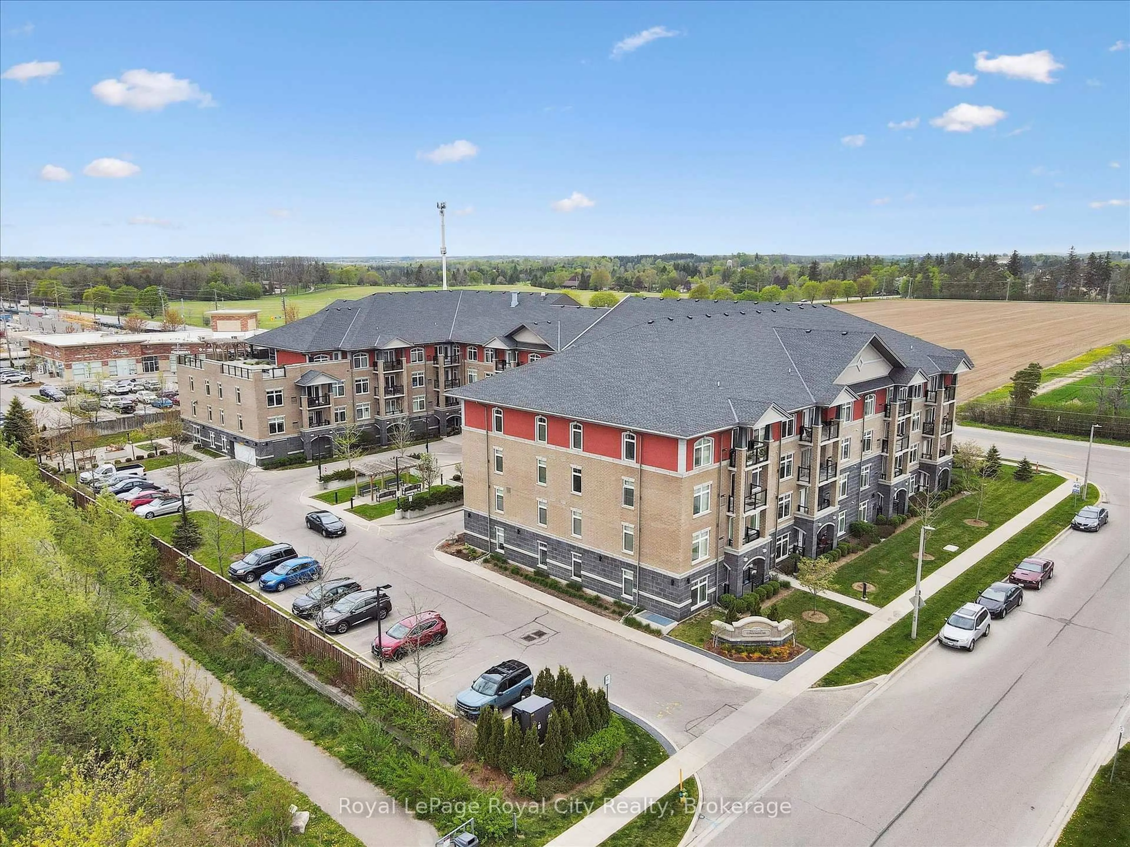 A pic from outside/outdoor area/front of a property/back of a property/a pic from drone, building for 106 Bard Blvd #202, Guelph Ontario N1L 0L8
