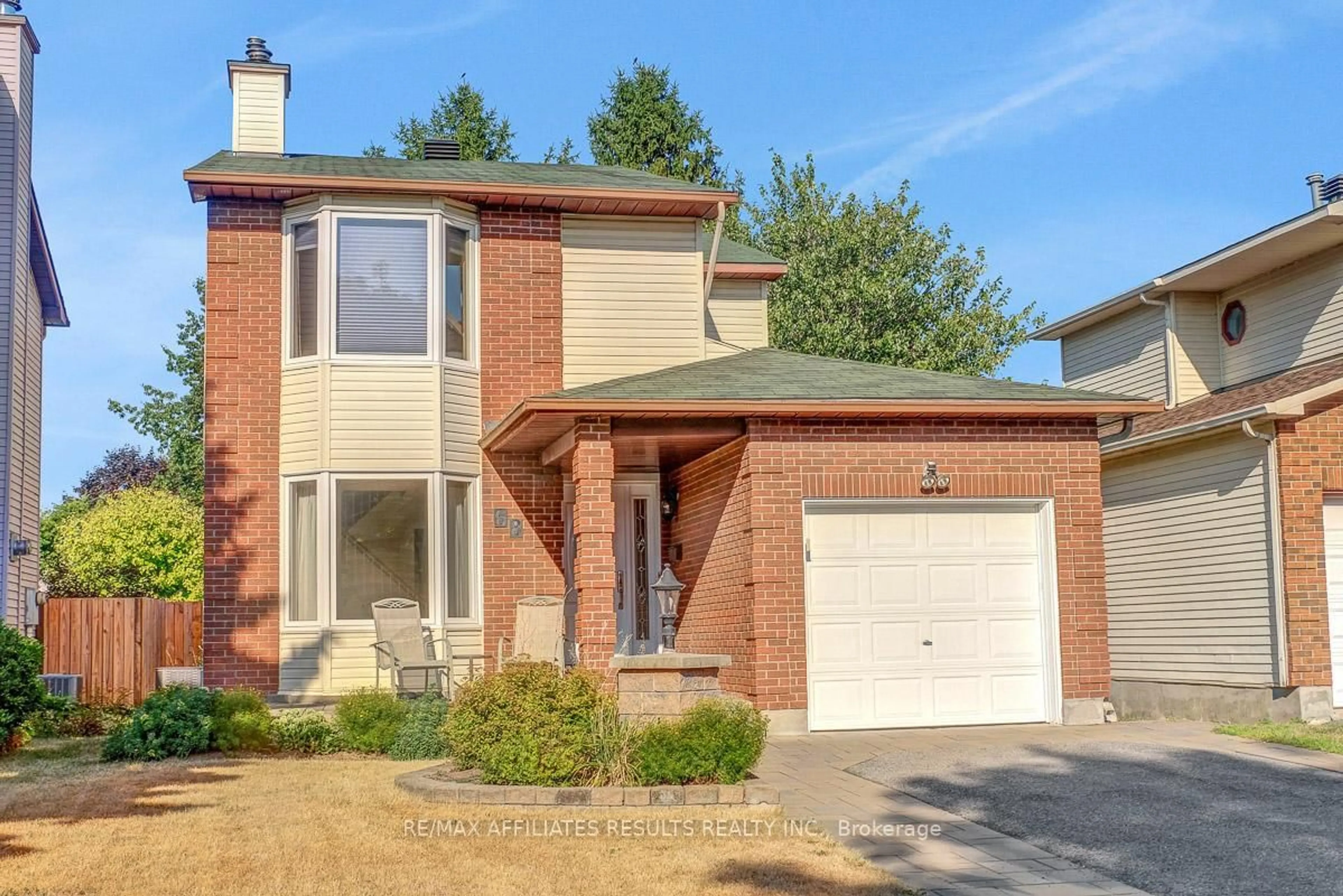 Home with brick exterior material, street for 68 Pheasant Run Dr, Ottawa Ontario K2J 2R4